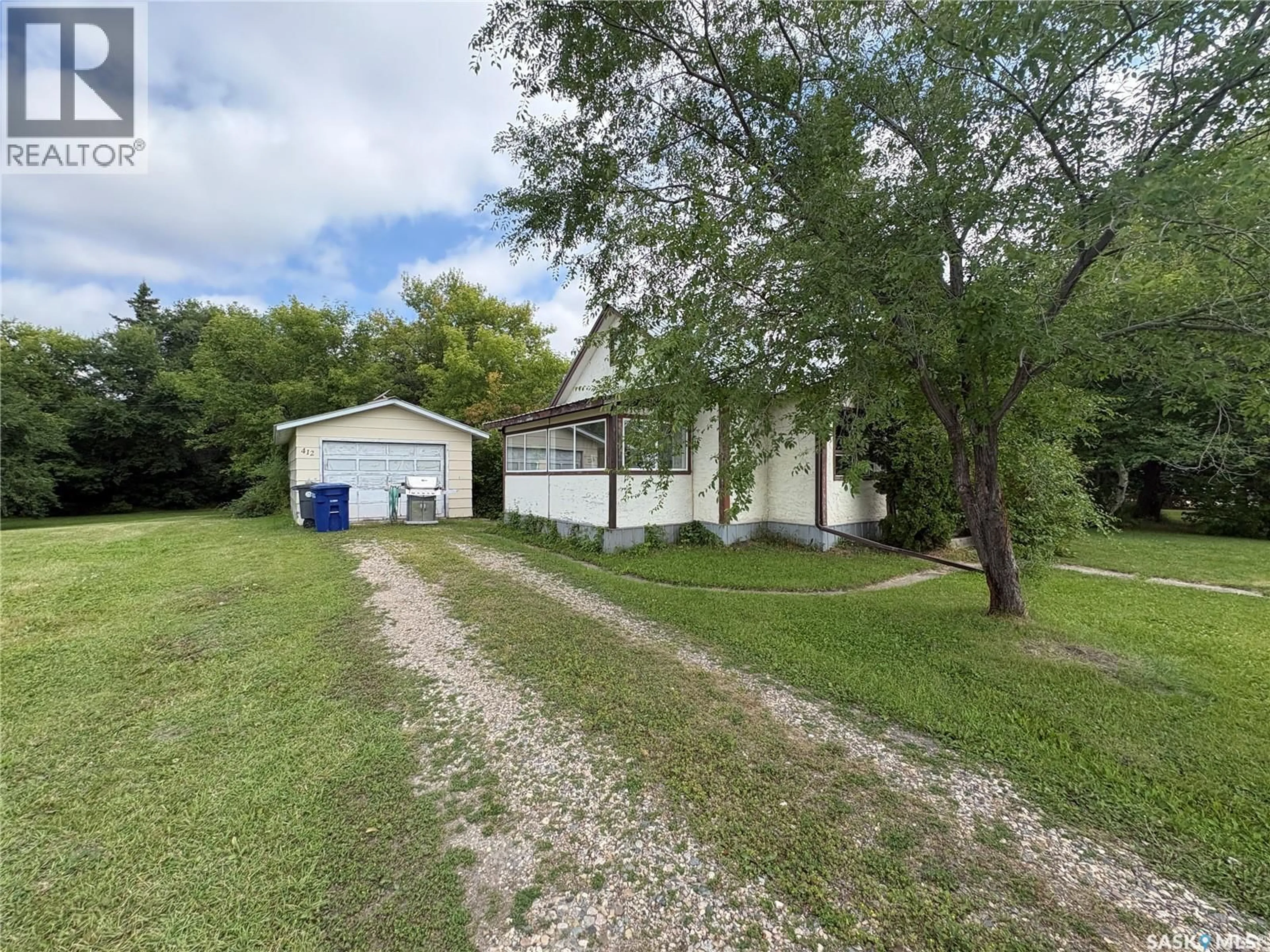A pic from outside/outdoor area/front of a property/back of a property/a pic from drone, unknown for 412 1ST AVENUE, Spy Hill Saskatchewan S0A3W0
