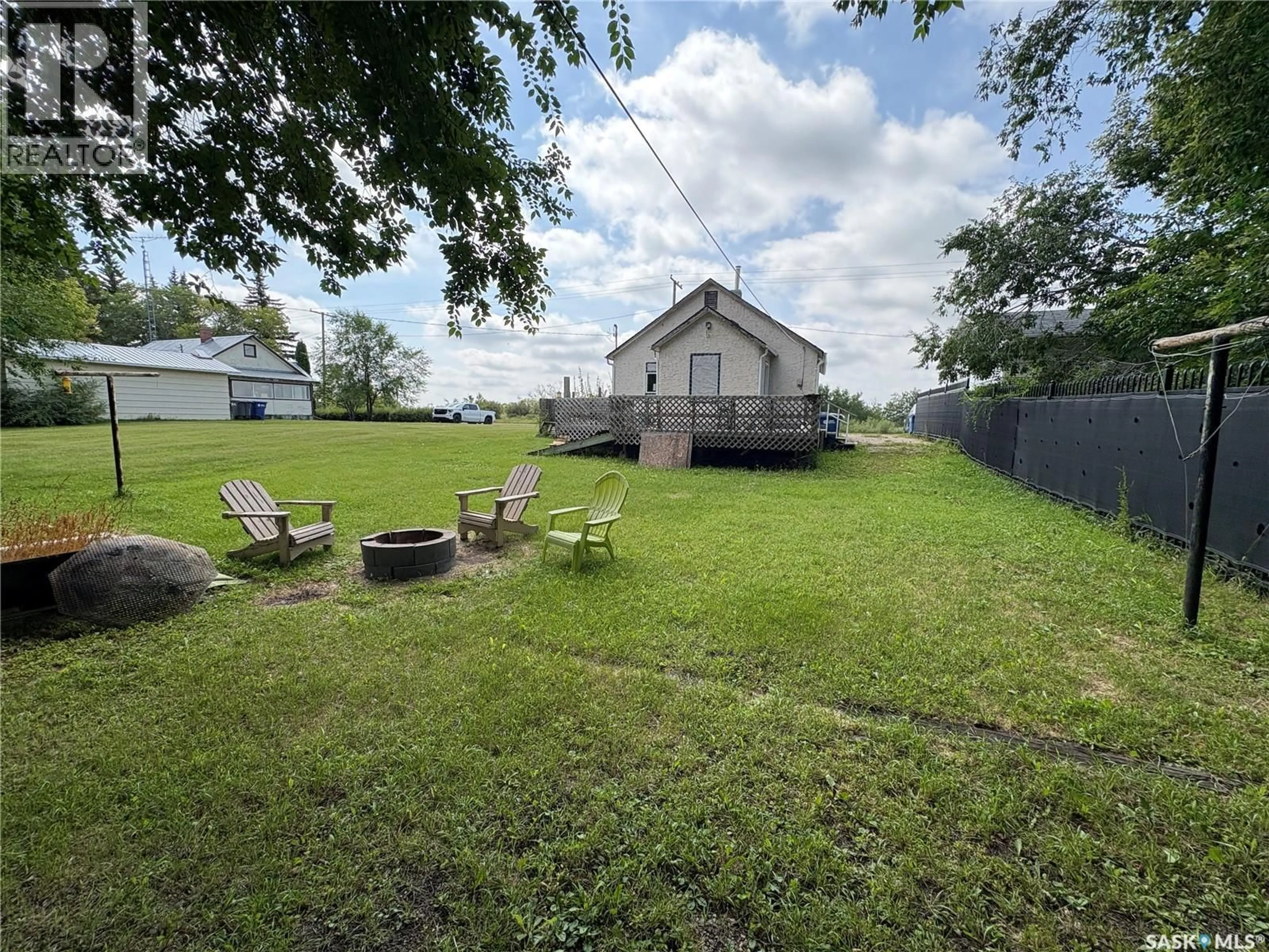 A pic from outside/outdoor area/front of a property/back of a property/a pic from drone, unknown for 408 1ST AVENUE, Spy Hill Saskatchewan S0A3W0