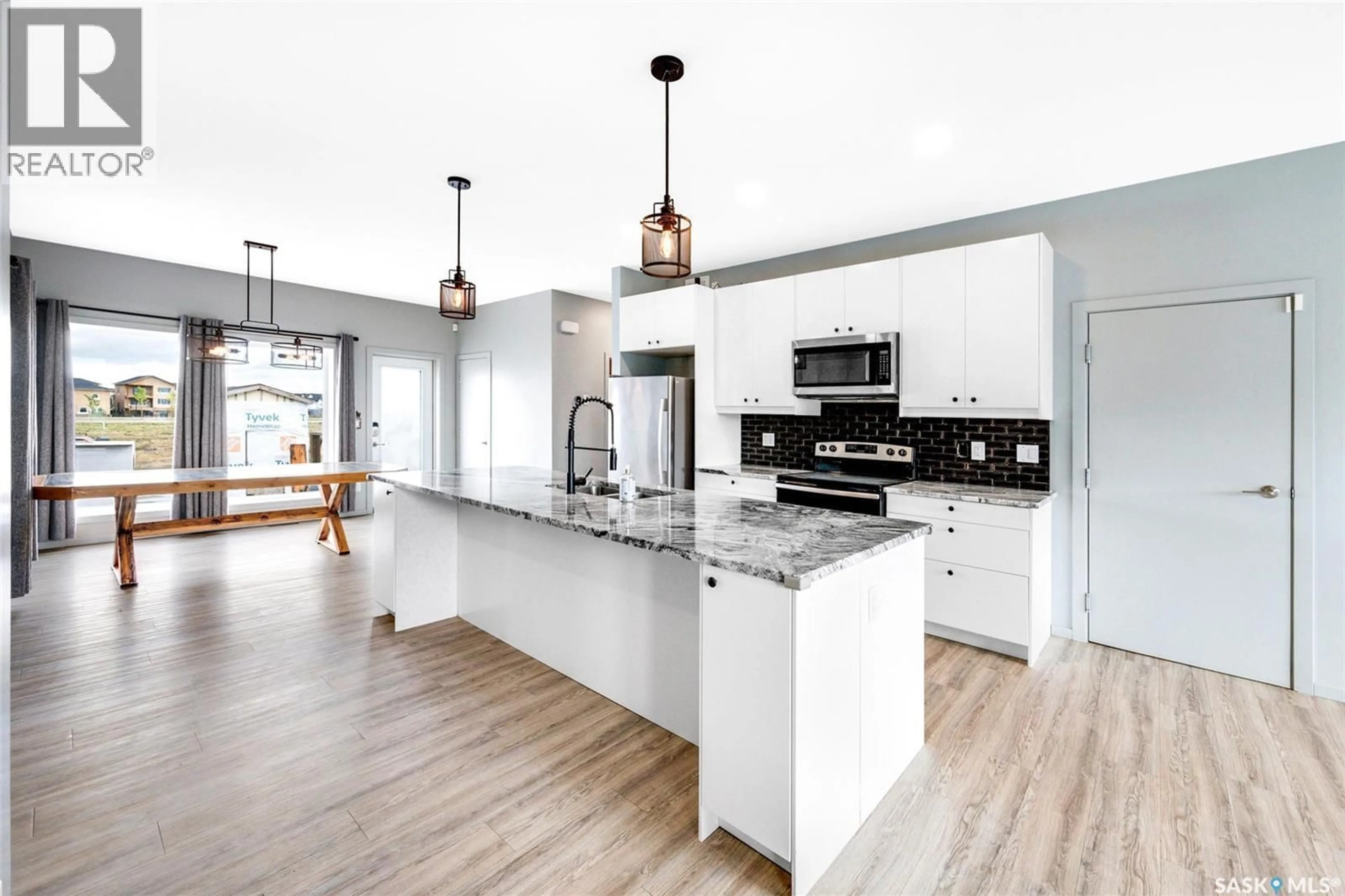 Open concept kitchen, unknown for 342 KENASCHUK LANE, Saskatoon Saskatchewan S7W0Y5