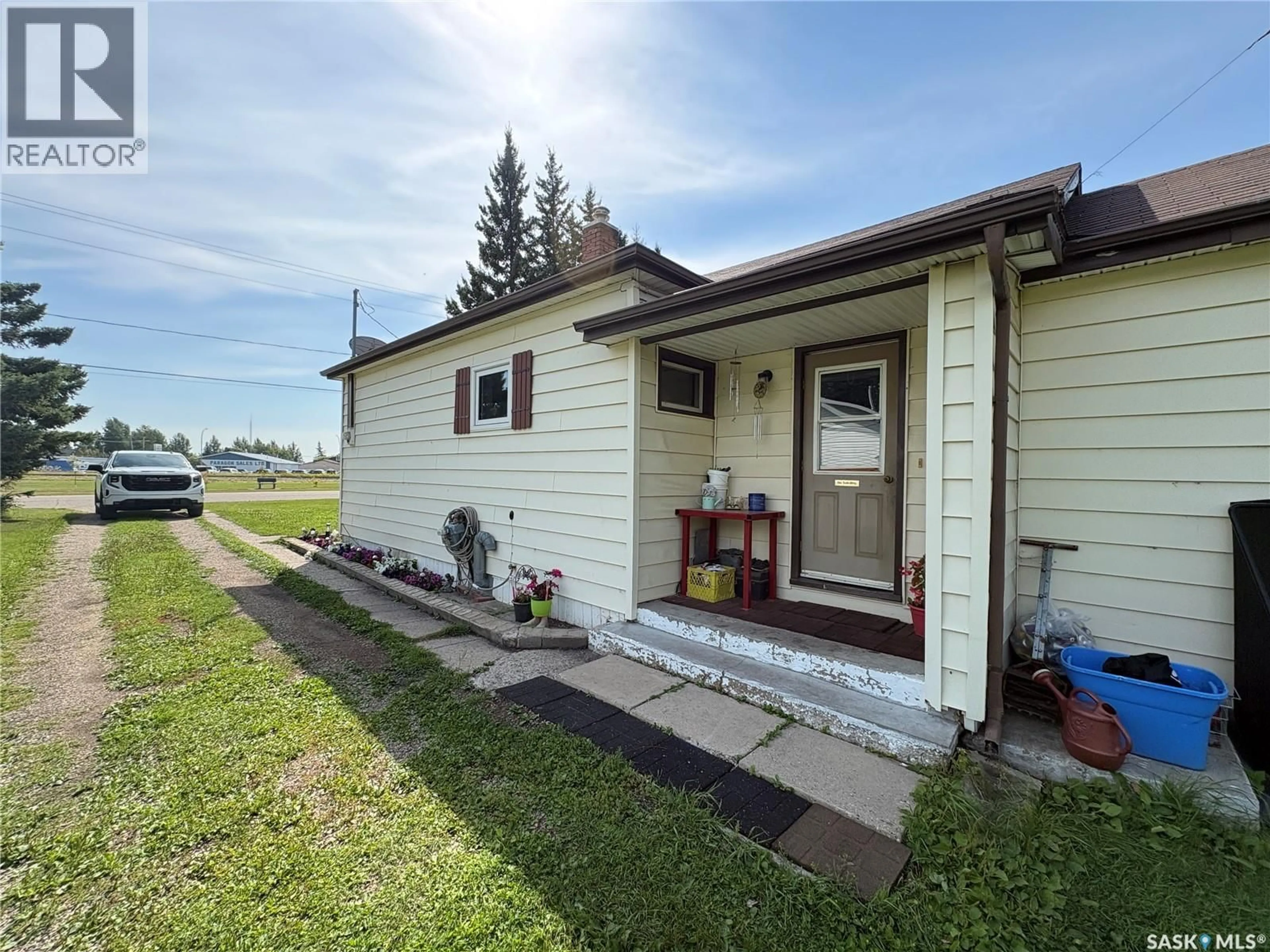 Home with vinyl exterior material, street for 114 ROAD AVENUE, Langenburg Saskatchewan S0A2A0