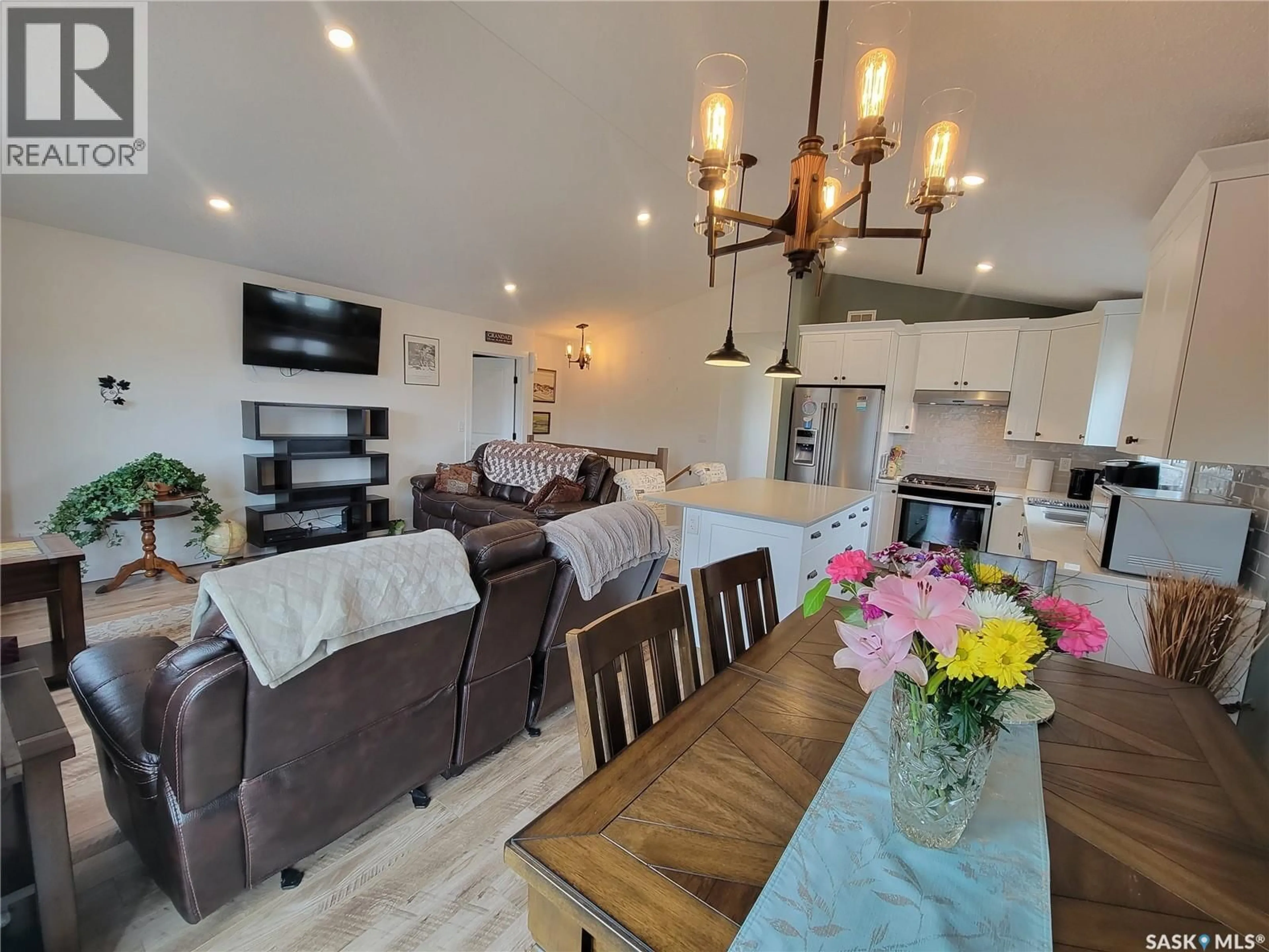 Open concept kitchen, wood/laminate floor for 214 1ST AVENUE, Maidstone Saskatchewan S0M1M0