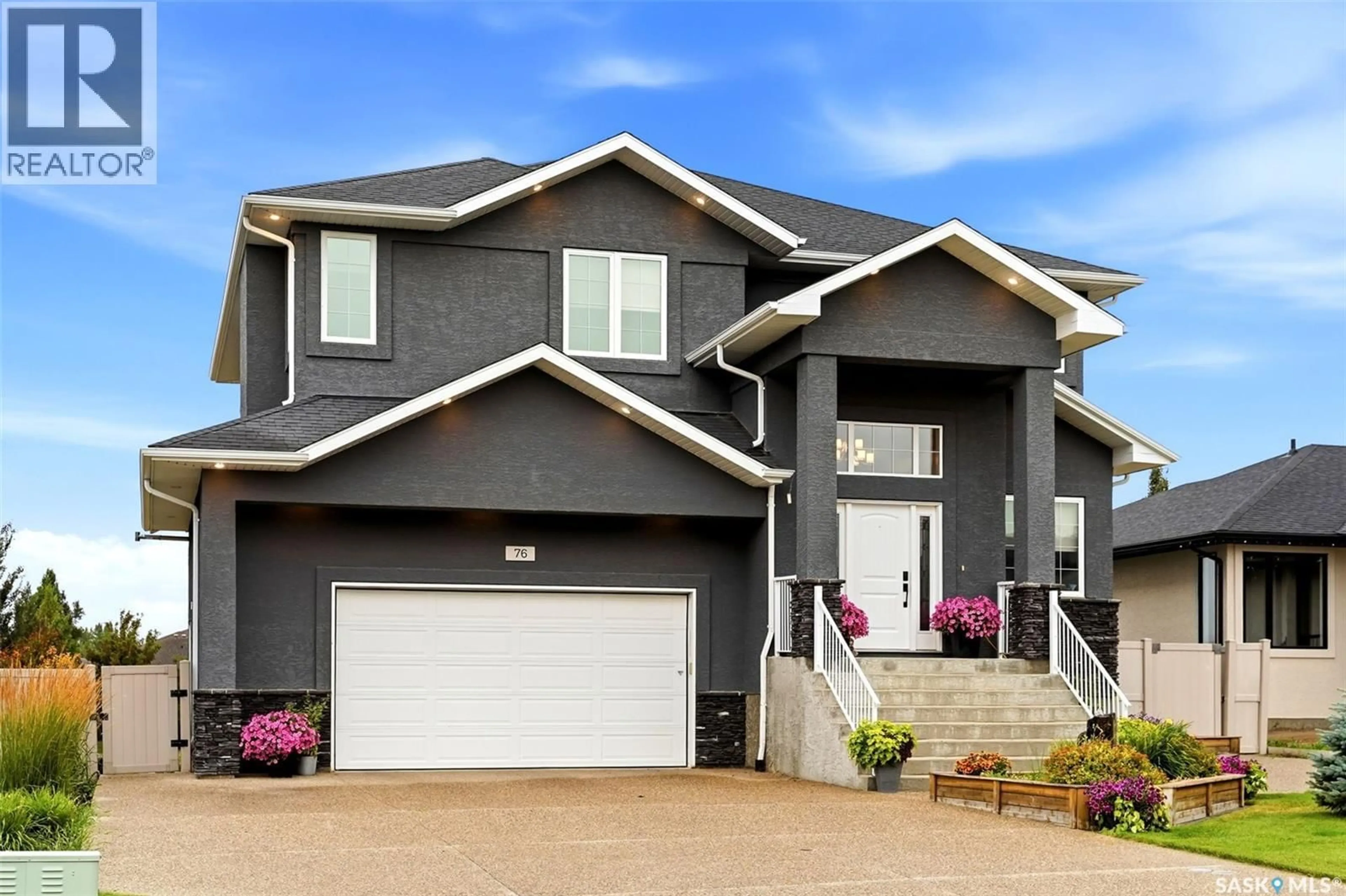 Home with vinyl exterior material, street for E - 76 EMERALD RIDGE, White City Saskatchewan S4L0B4