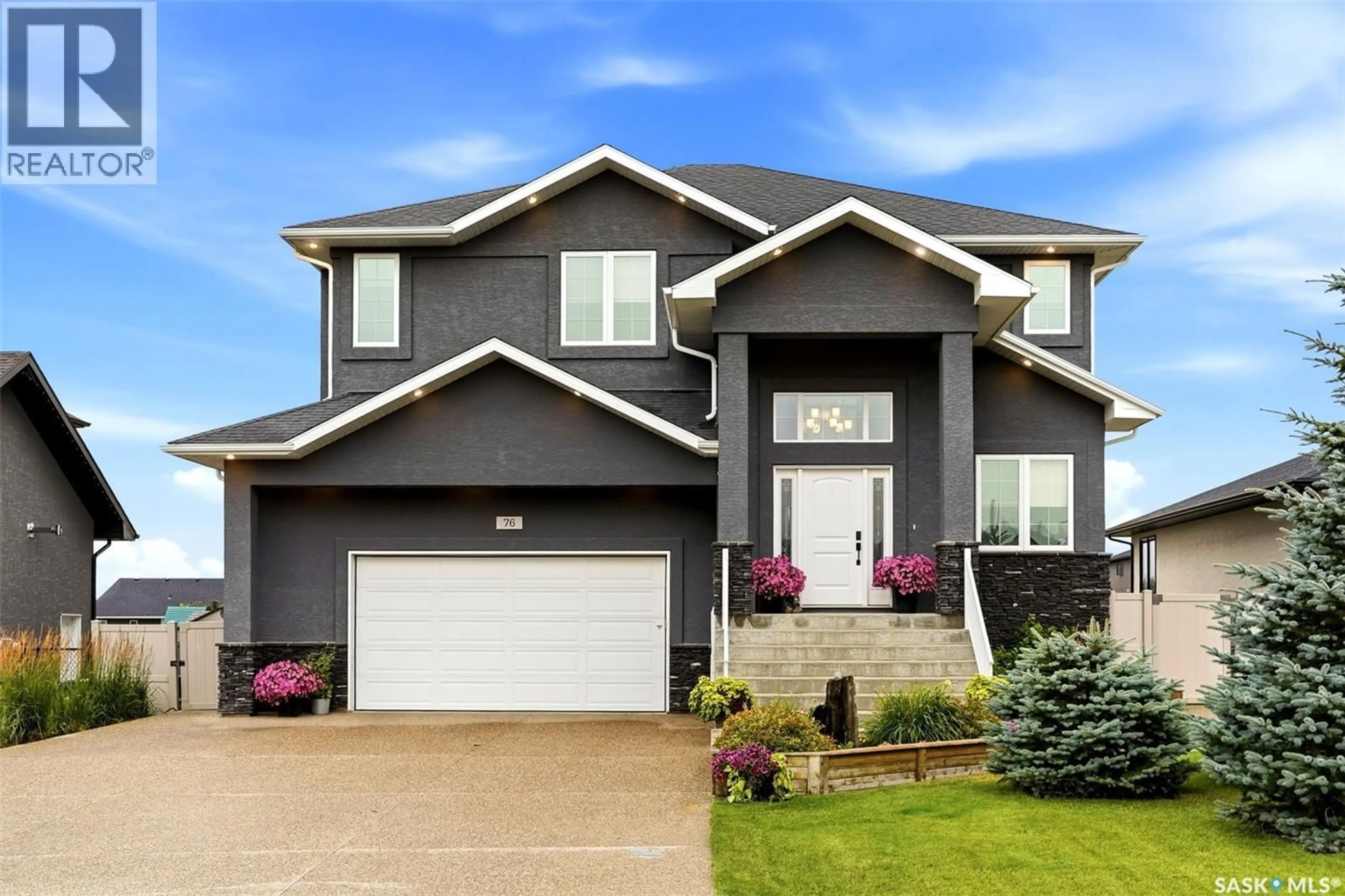 Home with vinyl exterior material, street for E - 76 EMERALD RIDGE, White City Saskatchewan S4L0B4