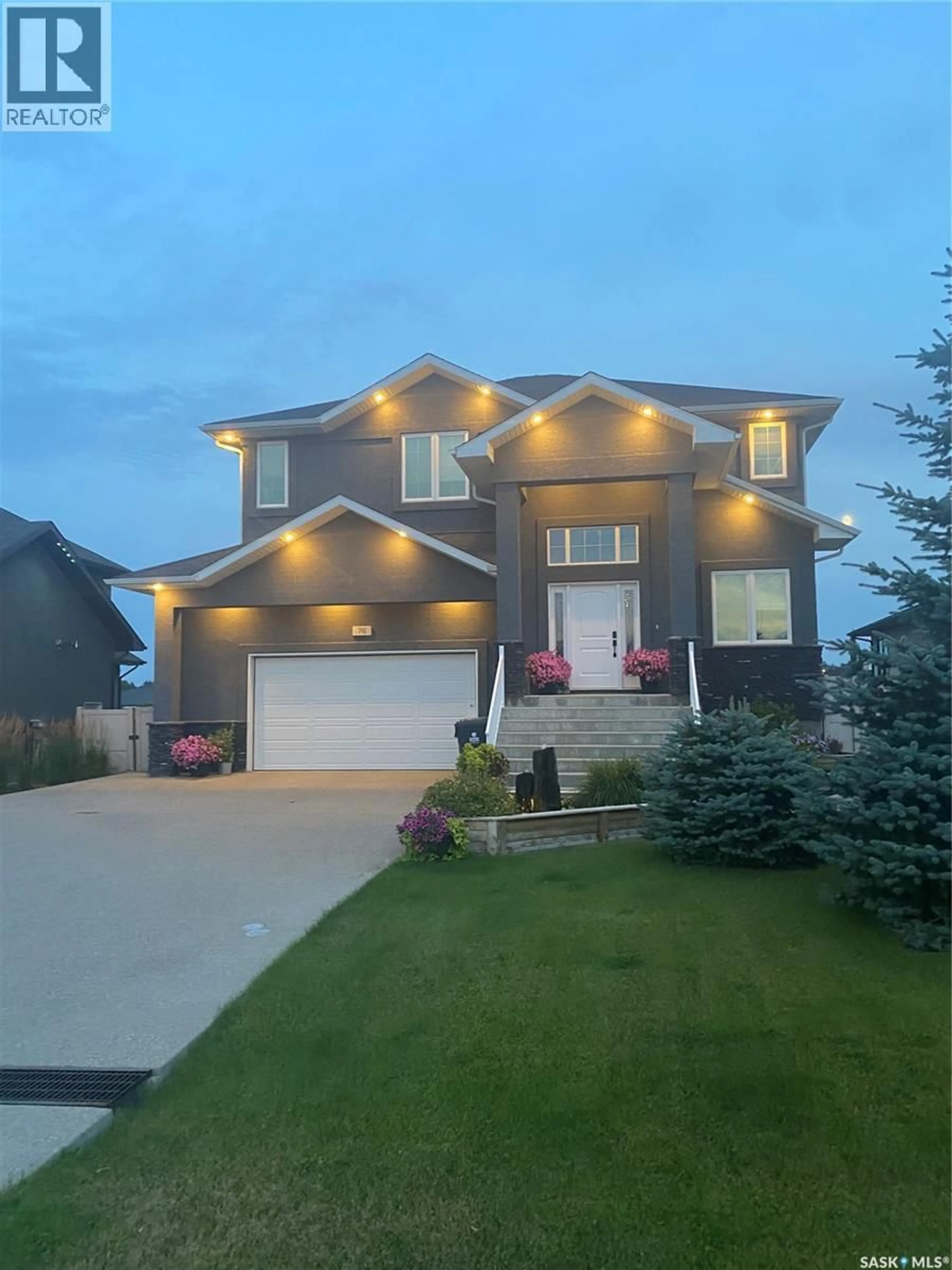 Home with vinyl exterior material, street for E - 76 EMERALD RIDGE, White City Saskatchewan S4L0B4