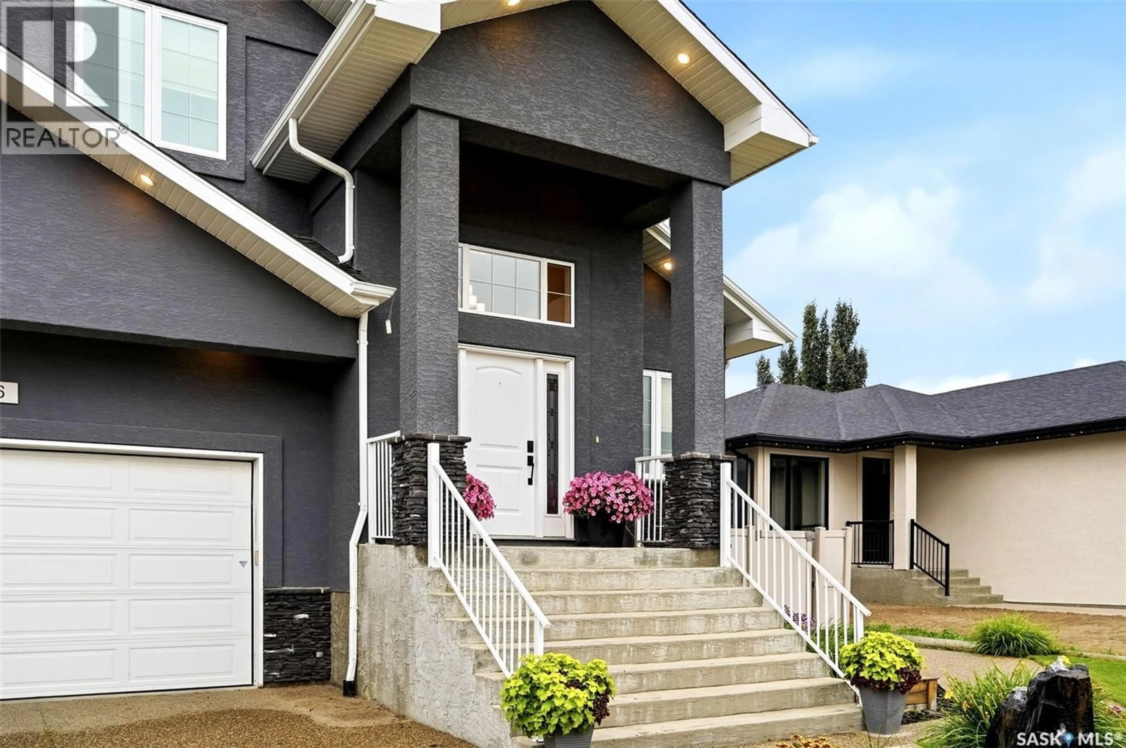 Home with vinyl exterior material, street for E - 76 EMERALD RIDGE, White City Saskatchewan S4L0B4