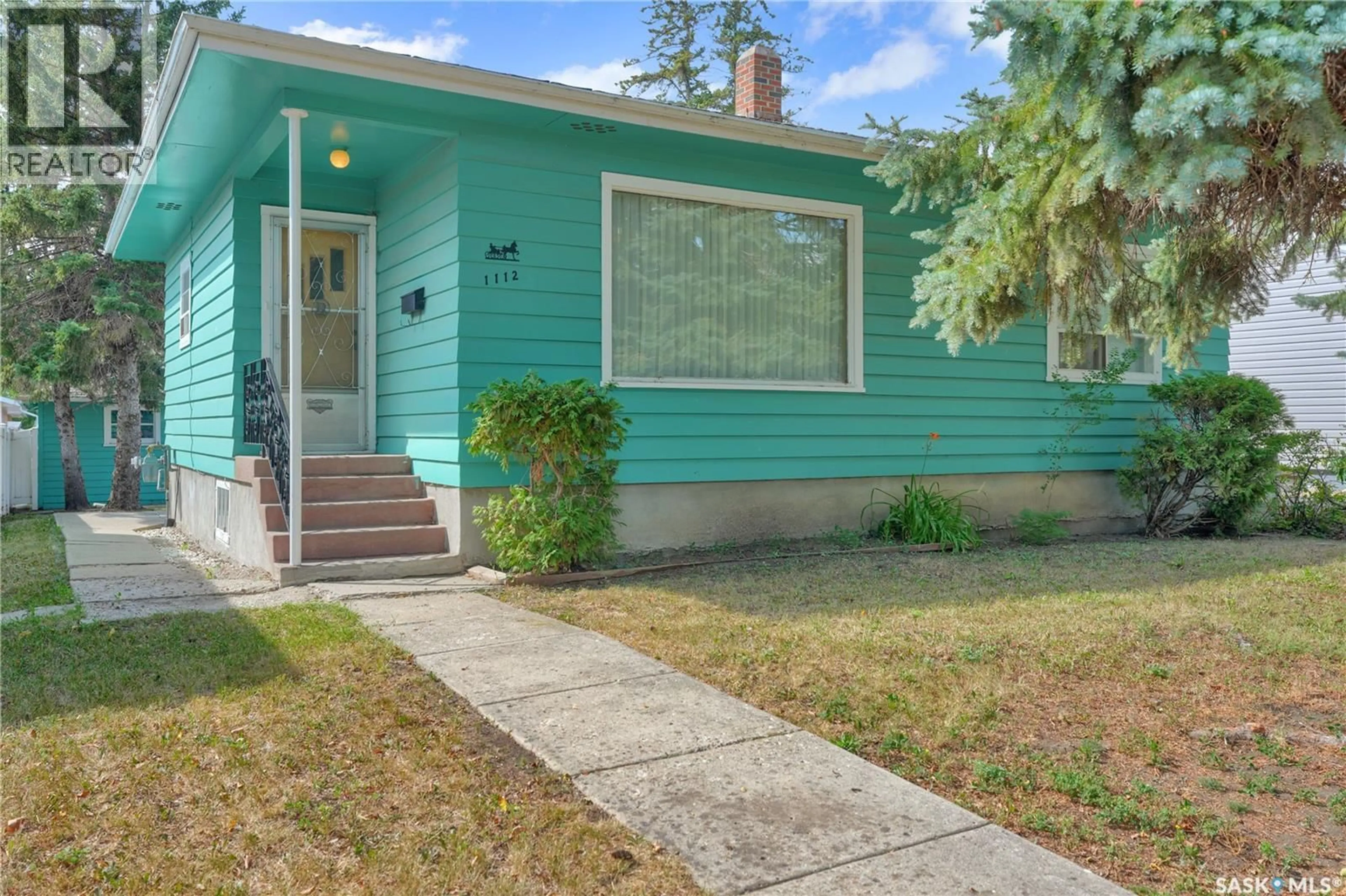 Home with vinyl exterior material, street for 1112 HORACE STREET, Regina Saskatchewan S4T5L4