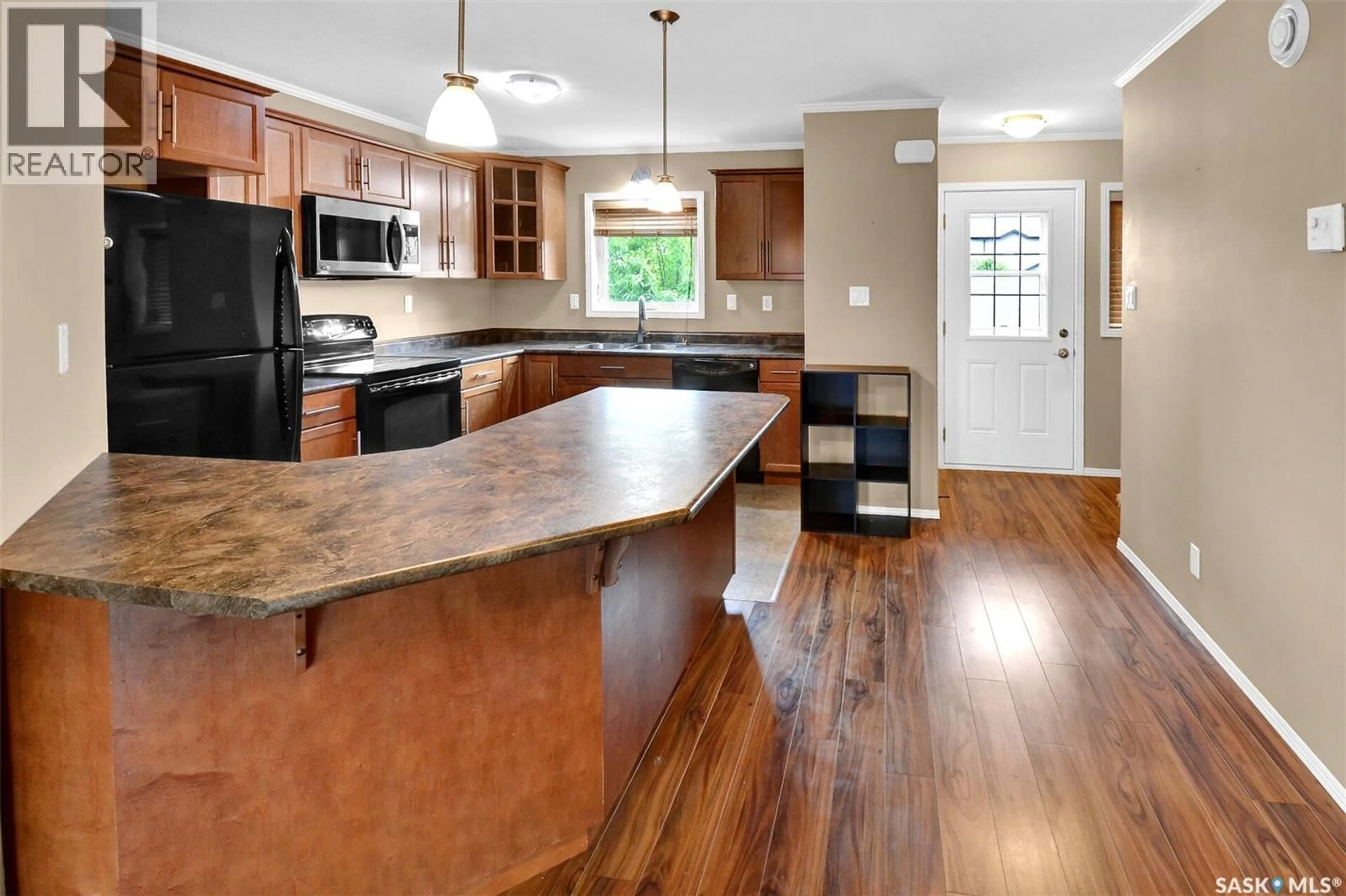 Open concept kitchen, unknown for 306 110 SHILLINGTON CRESCENT, Saskatoon Saskatchewan S7N3Z8