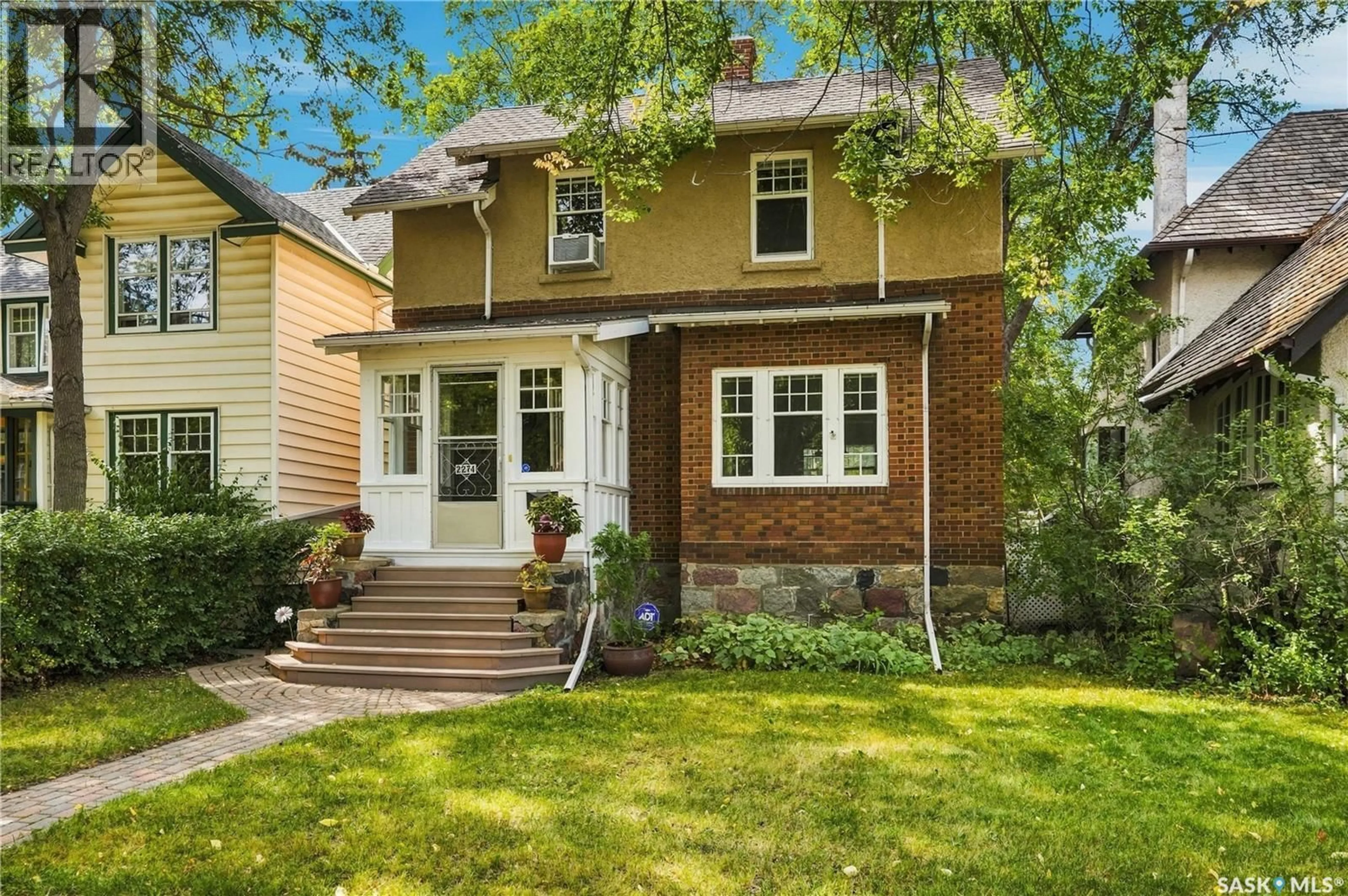 Home with brick exterior material, street for 2274 ELPHINSTONE STREET, Regina Saskatchewan S4T3N8