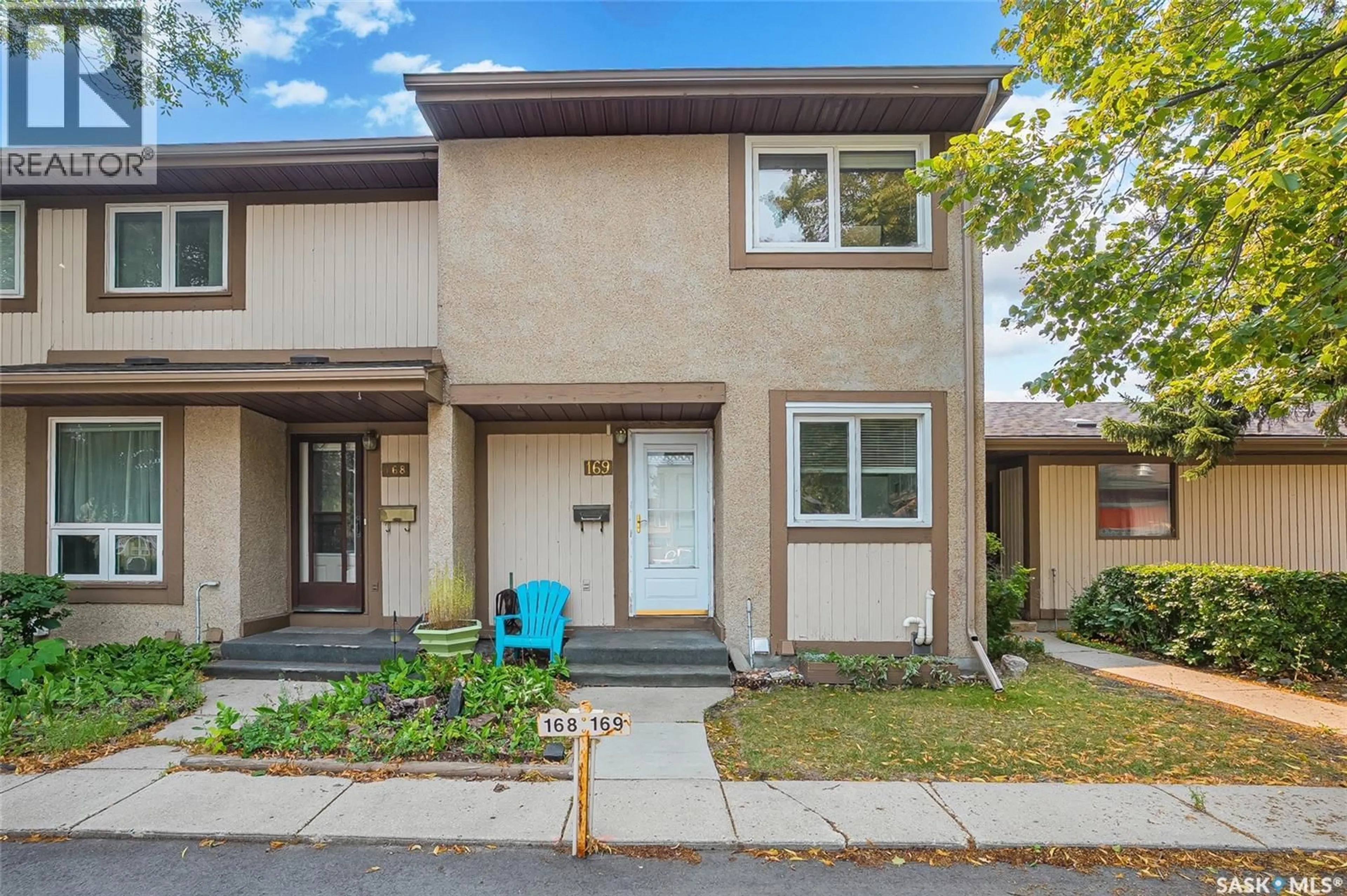 Home with vinyl exterior material, street for 1128 - 169 MCKERCHER DRIVE, Saskatoon Saskatchewan S7H4Y7