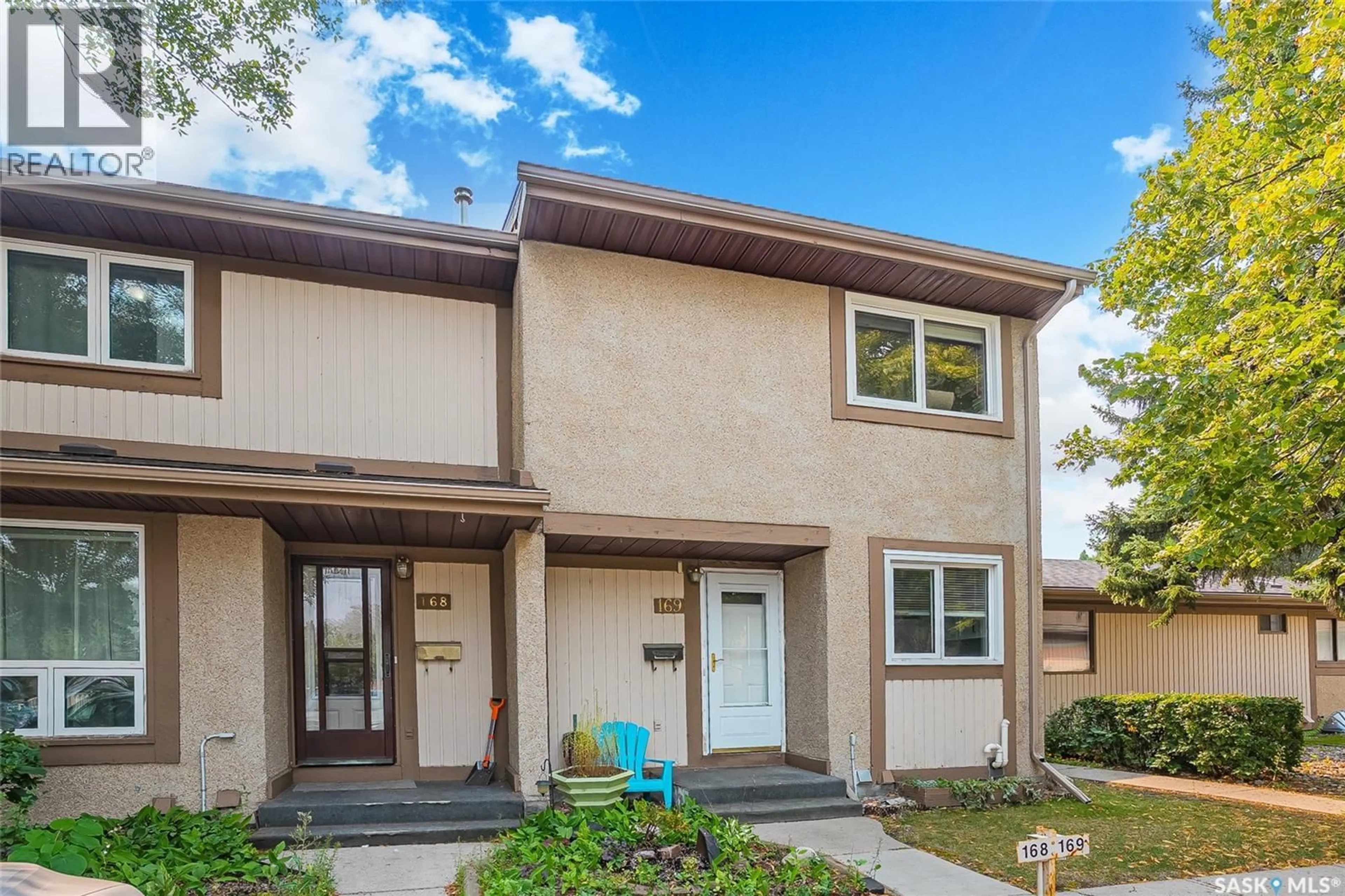 Home with vinyl exterior material, street for 1128 - 169 MCKERCHER DRIVE, Saskatoon Saskatchewan S7H4Y7