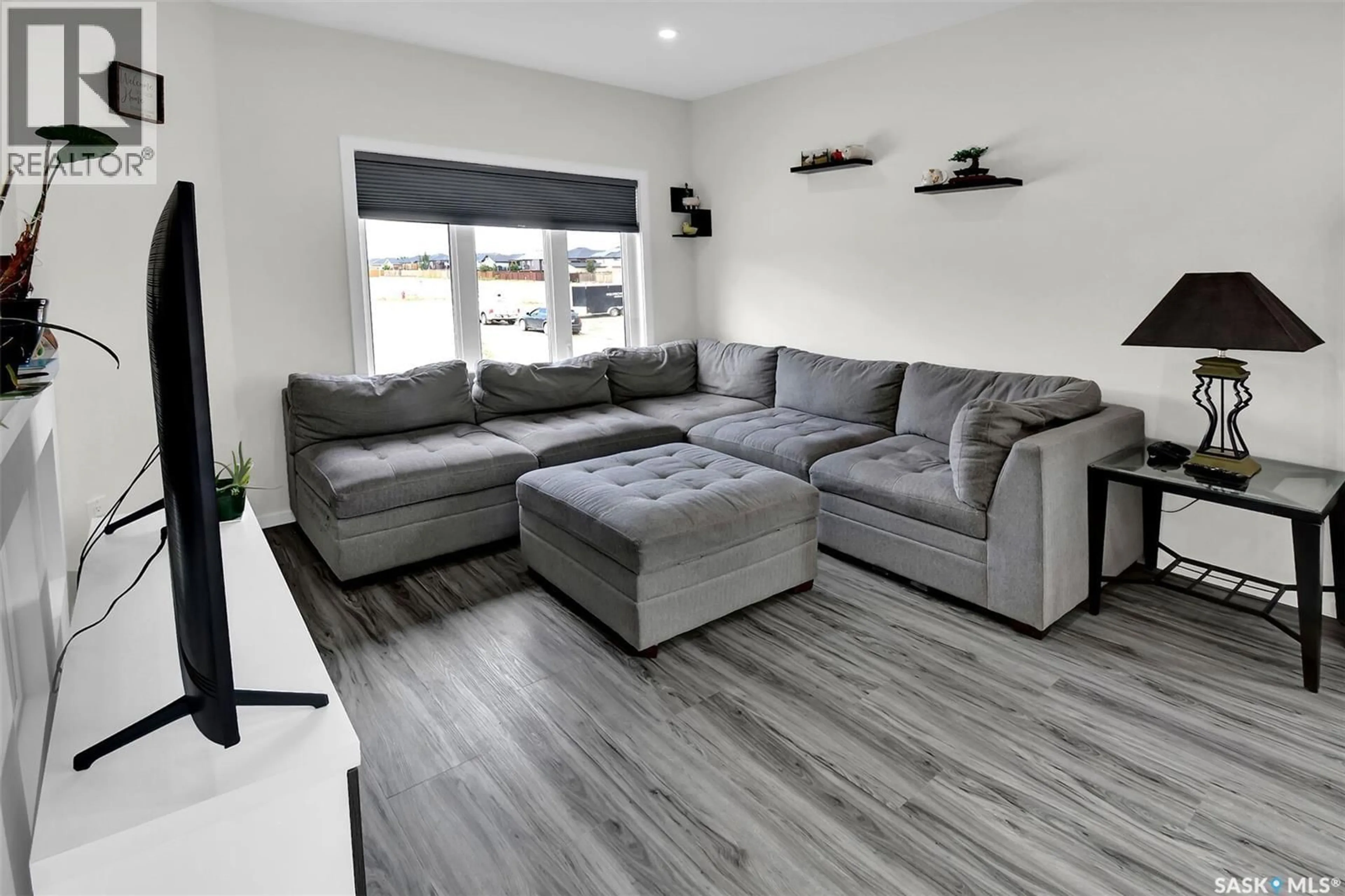 Living room with furniture, unknown for 500 FROESE STREET, Warman Saskatchewan S0K4S3