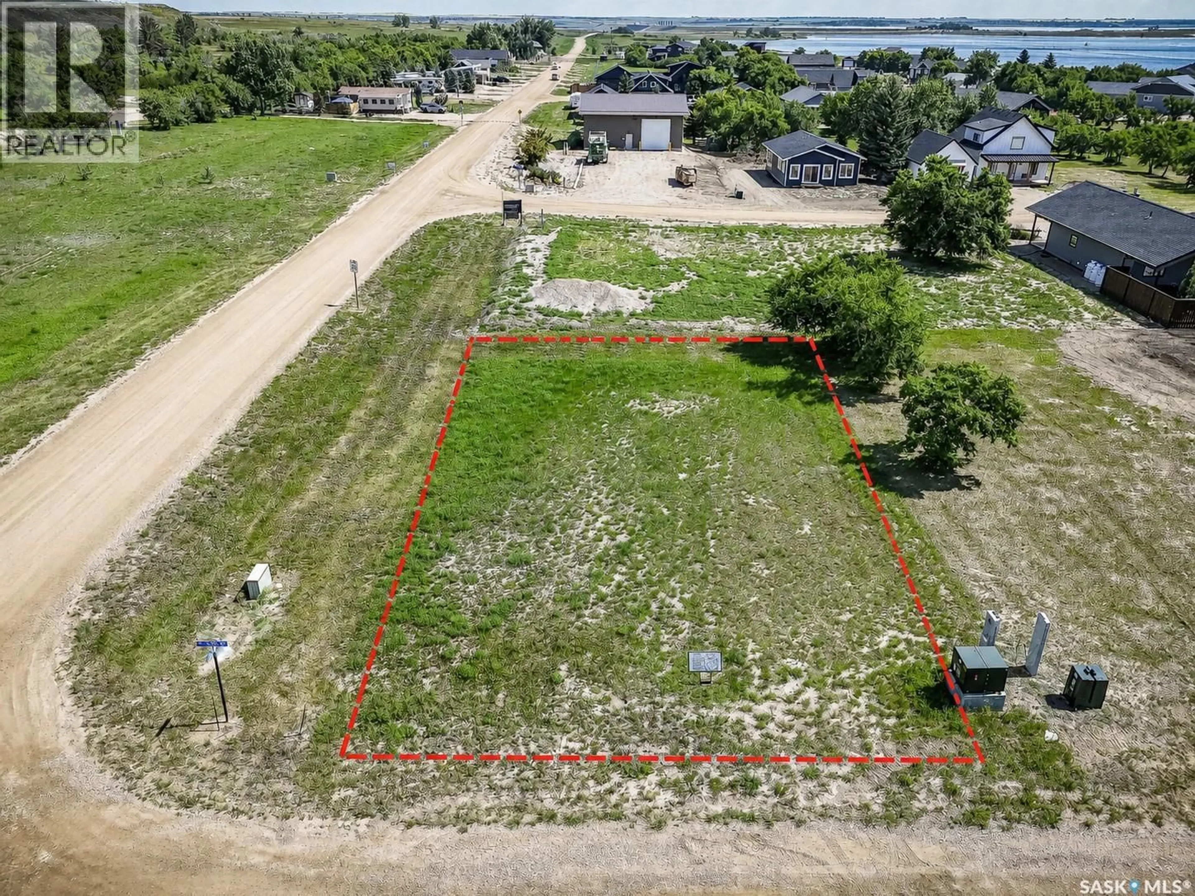 A pic from outside/outdoor area/front of a property/back of a property/a pic from drone, water/lake/river/ocean view for 38 WILLOW LANE, Diefenbaker Lake Saskatchewan S0L2E0