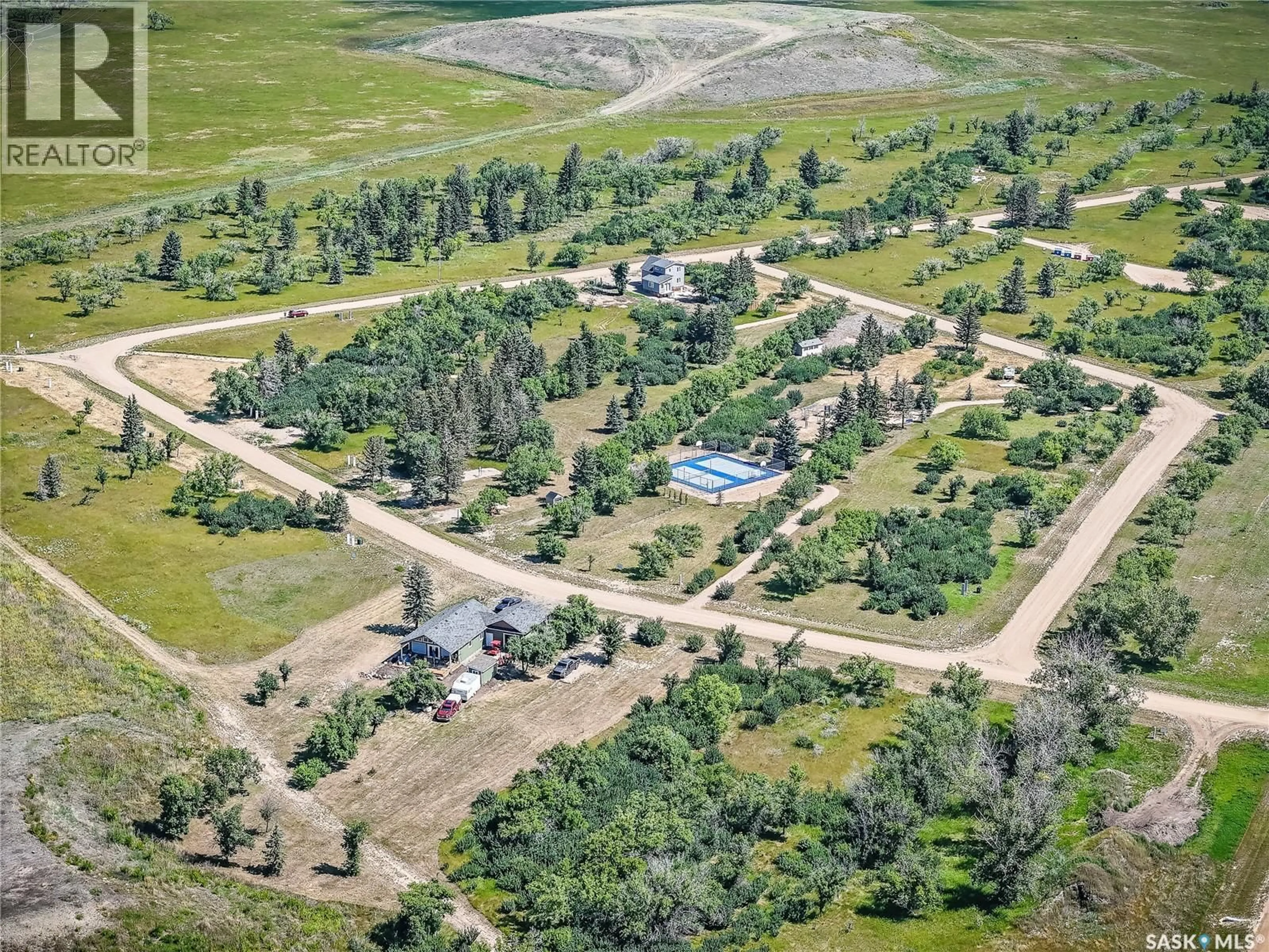 A pic from outside/outdoor area/front of a property/back of a property/a pic from drone, unknown for 38 WILLOW LANE, Diefenbaker Lake Saskatchewan S0L2E0