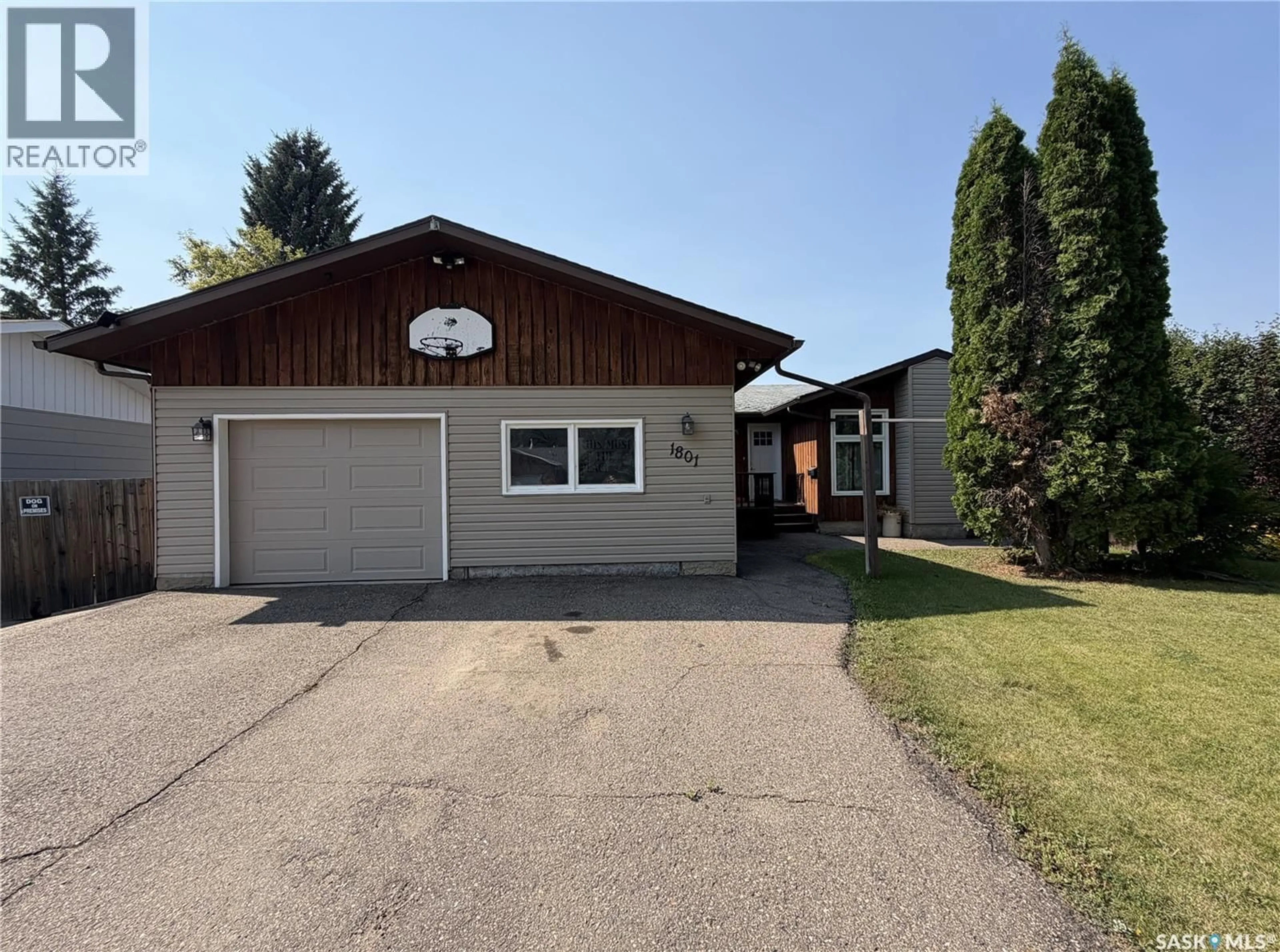 Home with vinyl exterior material, street for 1801 CENTENNIAL CRESCENT, North Battleford Saskatchewan S9A3J2