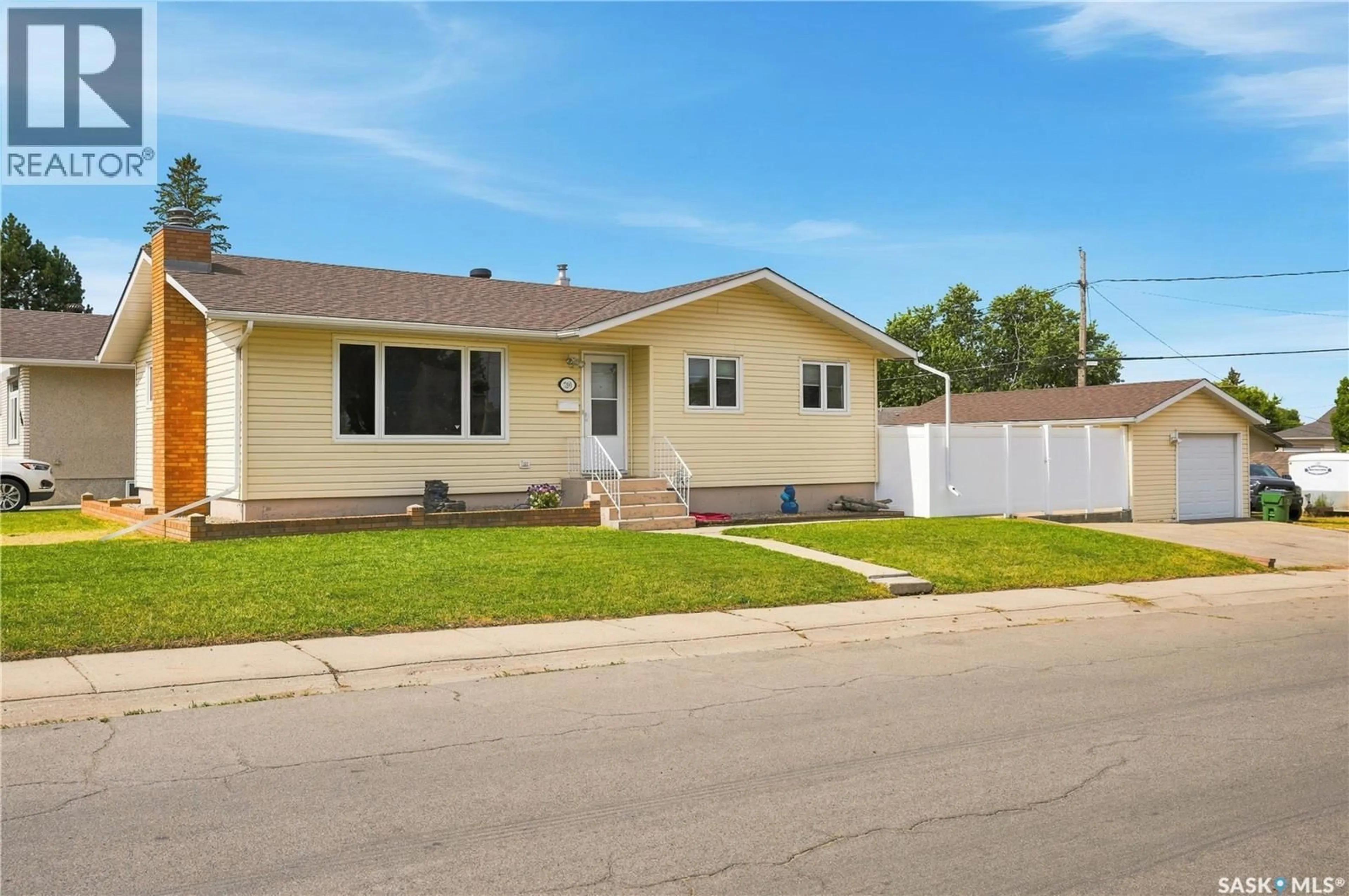 Home with vinyl exterior material, street for 790 13TH AVENUE, Moose Jaw Saskatchewan S6H6H6