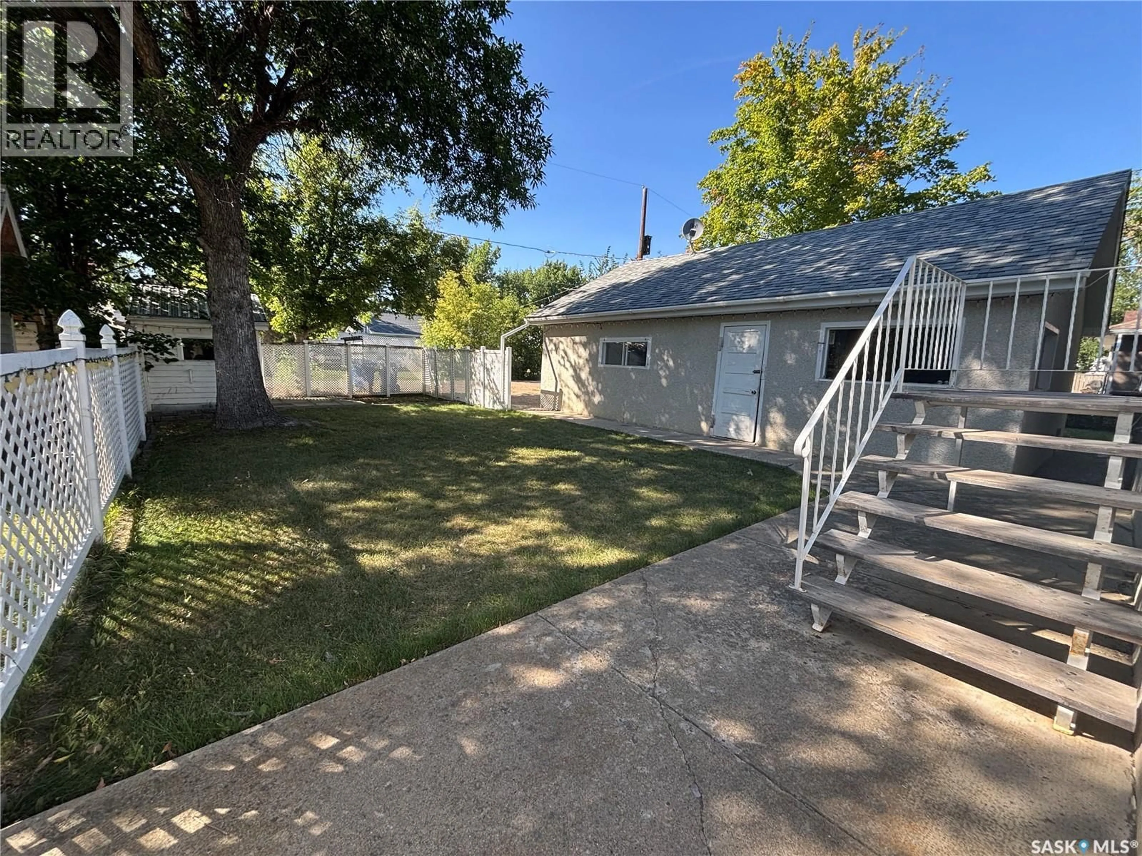 A pic from outside/outdoor area/front of a property/back of a property/a pic from drone, street for 211 ASPEN STREET, Maple Creek Saskatchewan S0N1N0