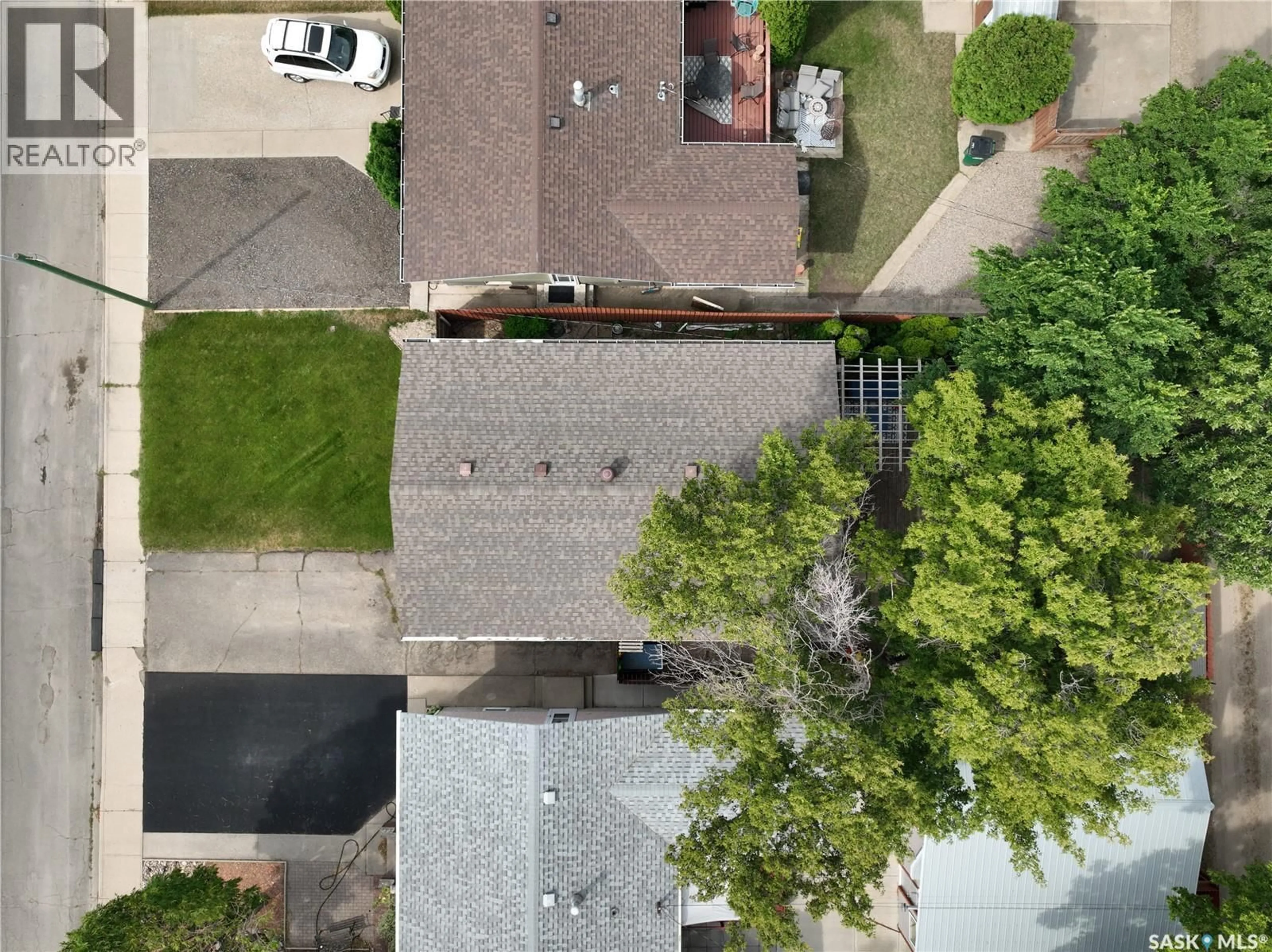 A pic from outside/outdoor area/front of a property/back of a property/a pic from drone, street for 1214 GRANDVIEW STREET, Moose Jaw Saskatchewan S6H5M2