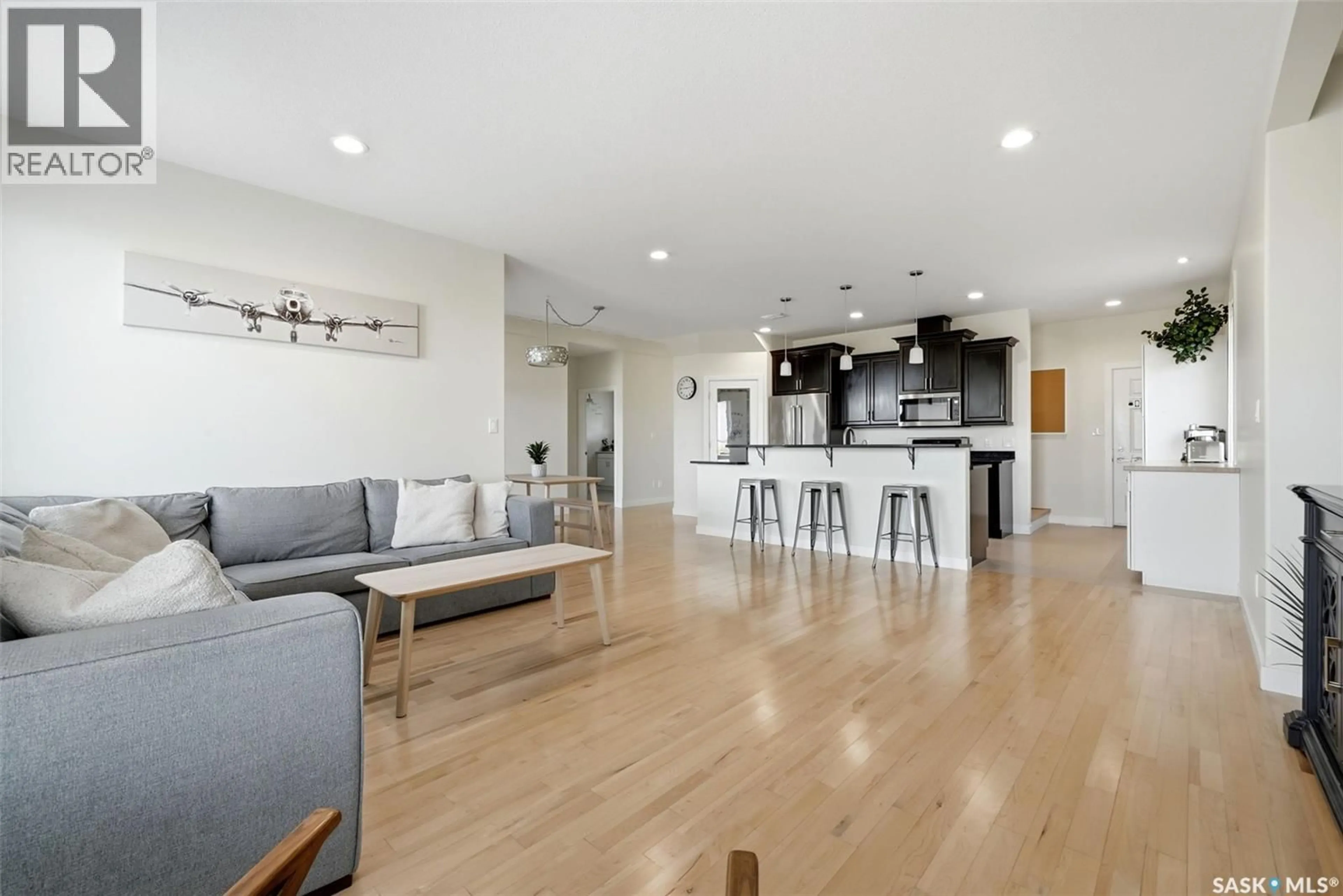 Open concept kitchen, wood/laminate floor for 23 CENTENNIAL DRIVE, Grand Coulee Saskatchewan S4M0A3