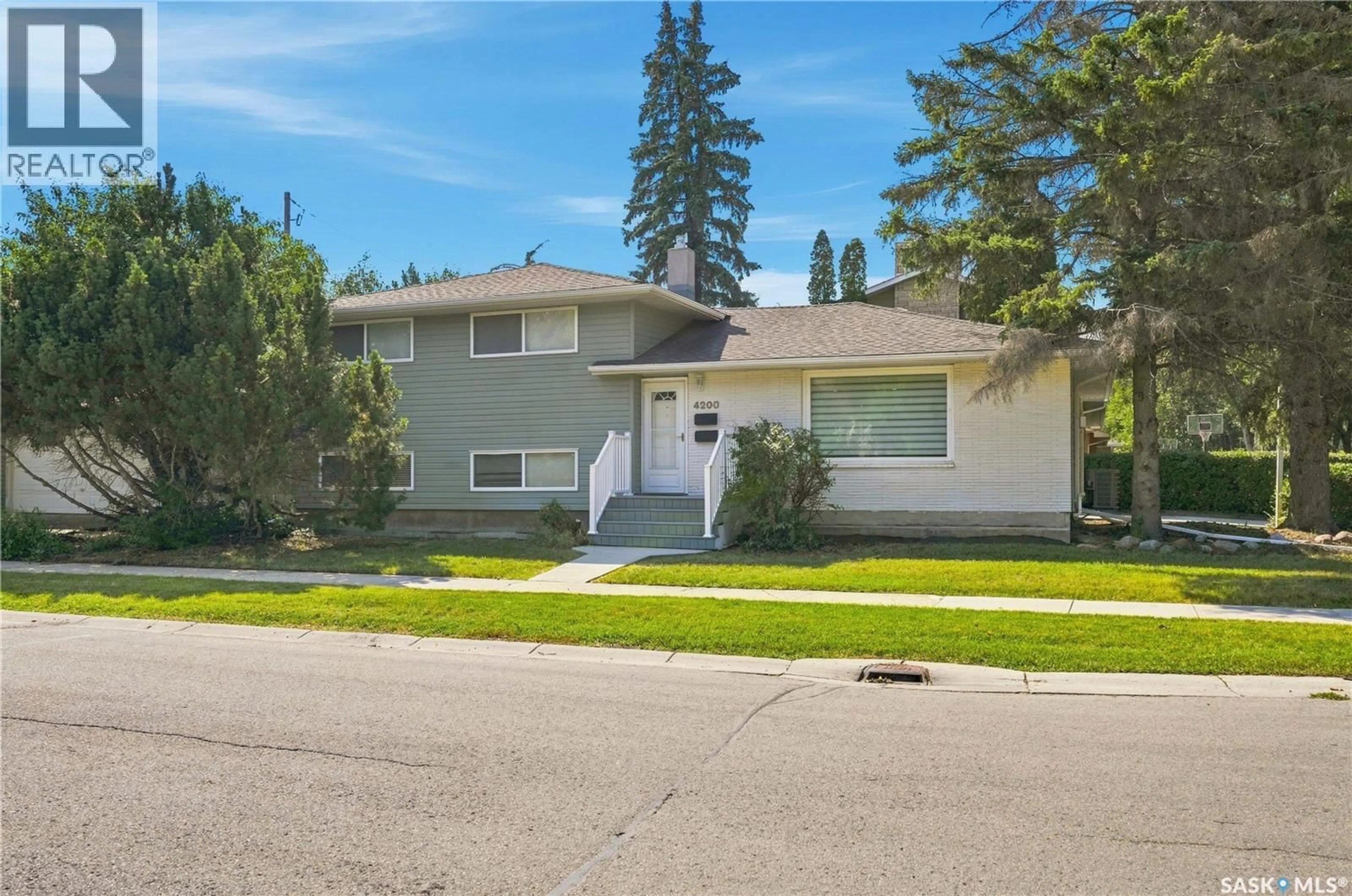 Home with vinyl exterior material, street for 4200 HILLSDALE STREET, Regina Saskatchewan S4S3Z2