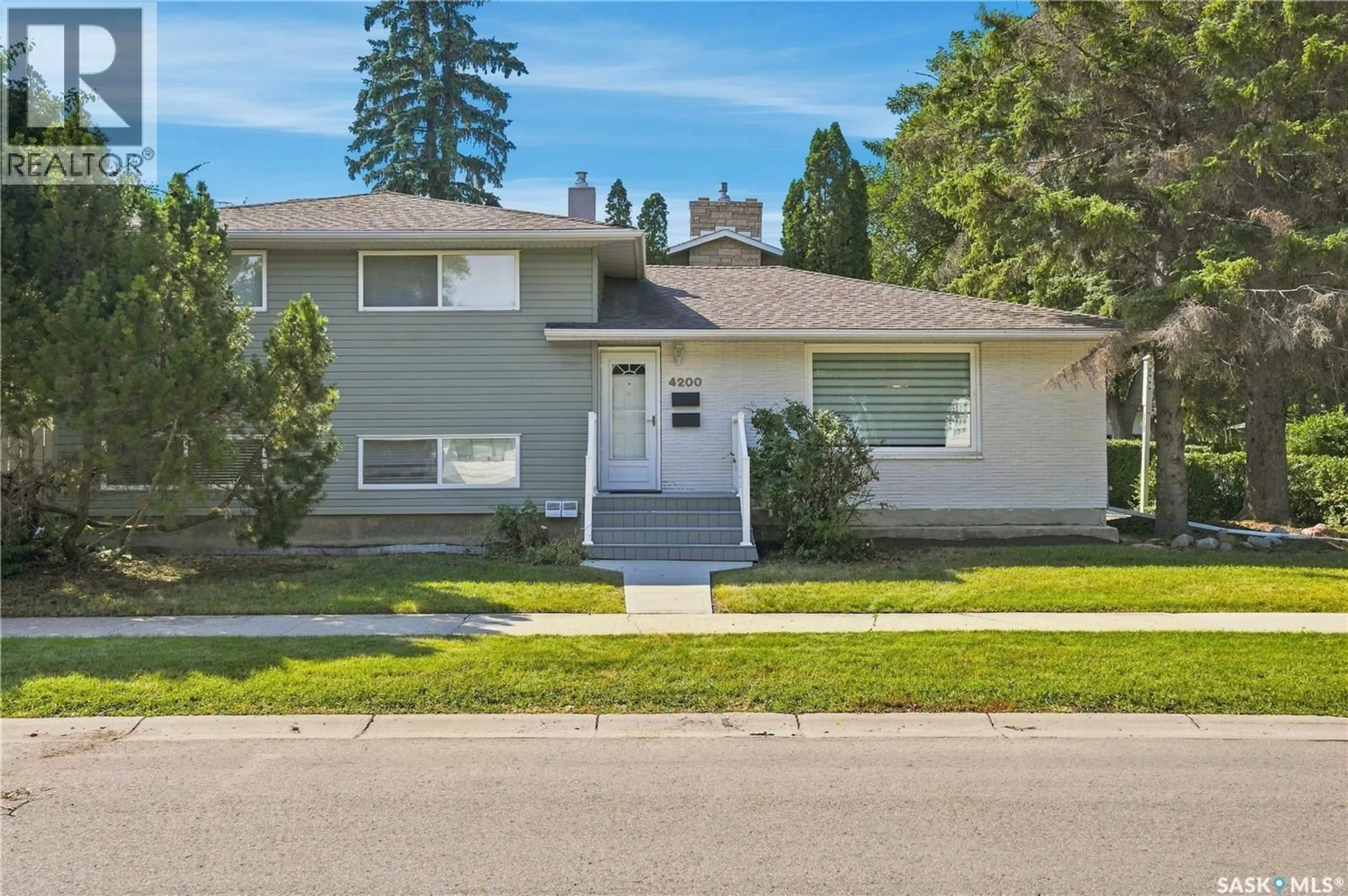 Home with vinyl exterior material, street for 4200 HILLSDALE STREET, Regina Saskatchewan S4S3Z2
