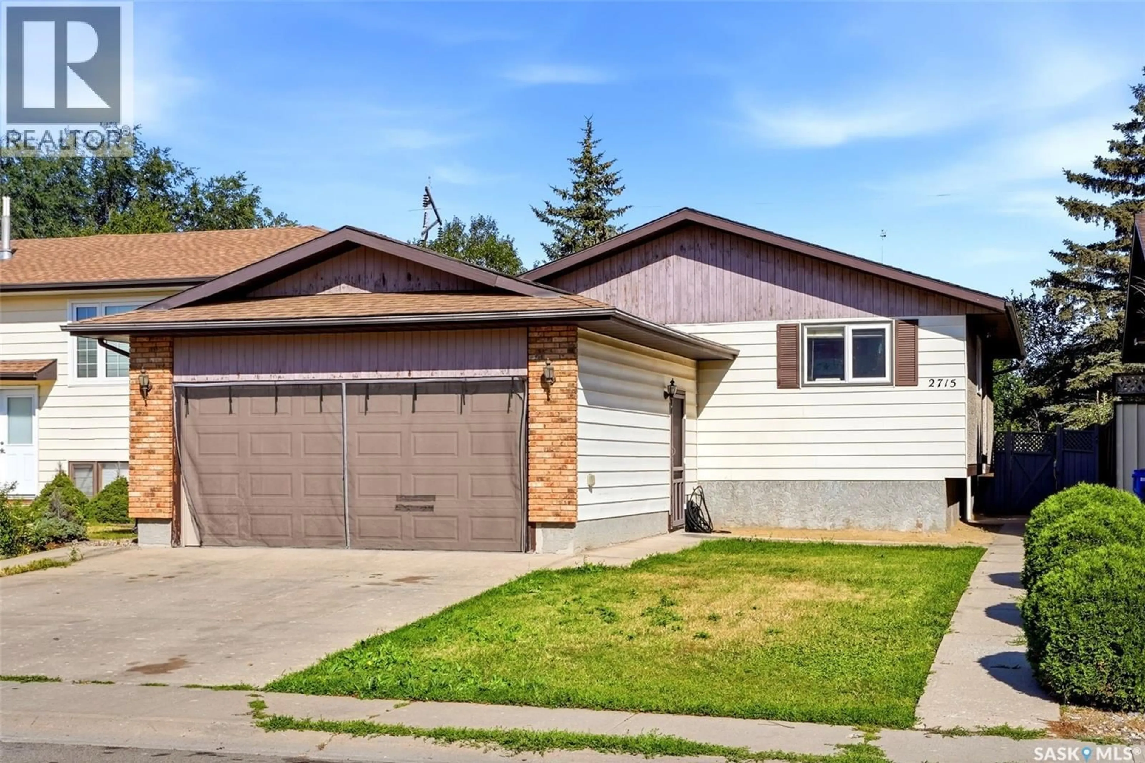 Home with vinyl exterior material, street for 2715 CORBETT ROAD, Regina Saskatchewan S4R8J1