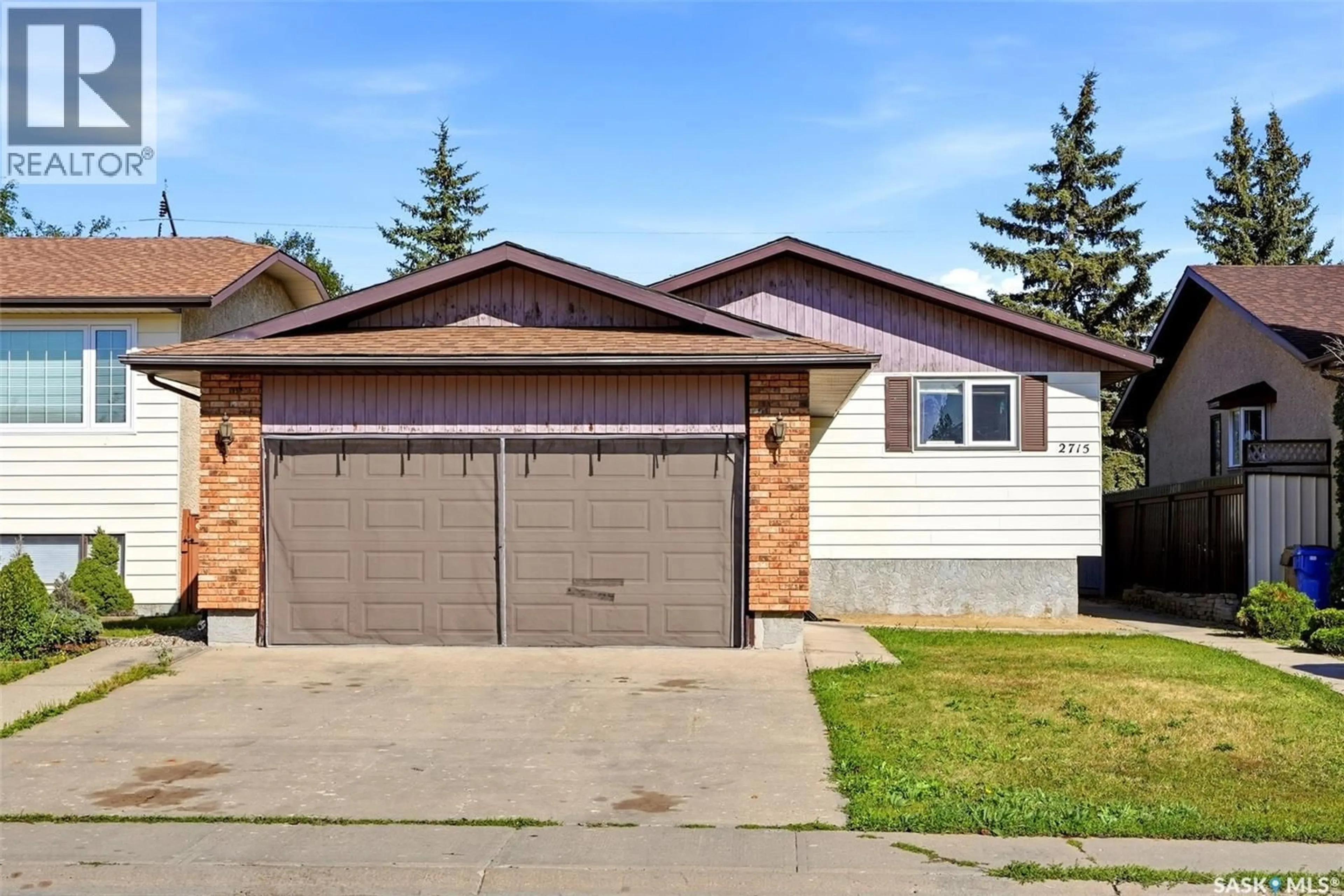 Home with vinyl exterior material, street for 2715 CORBETT ROAD, Regina Saskatchewan S4R8J1