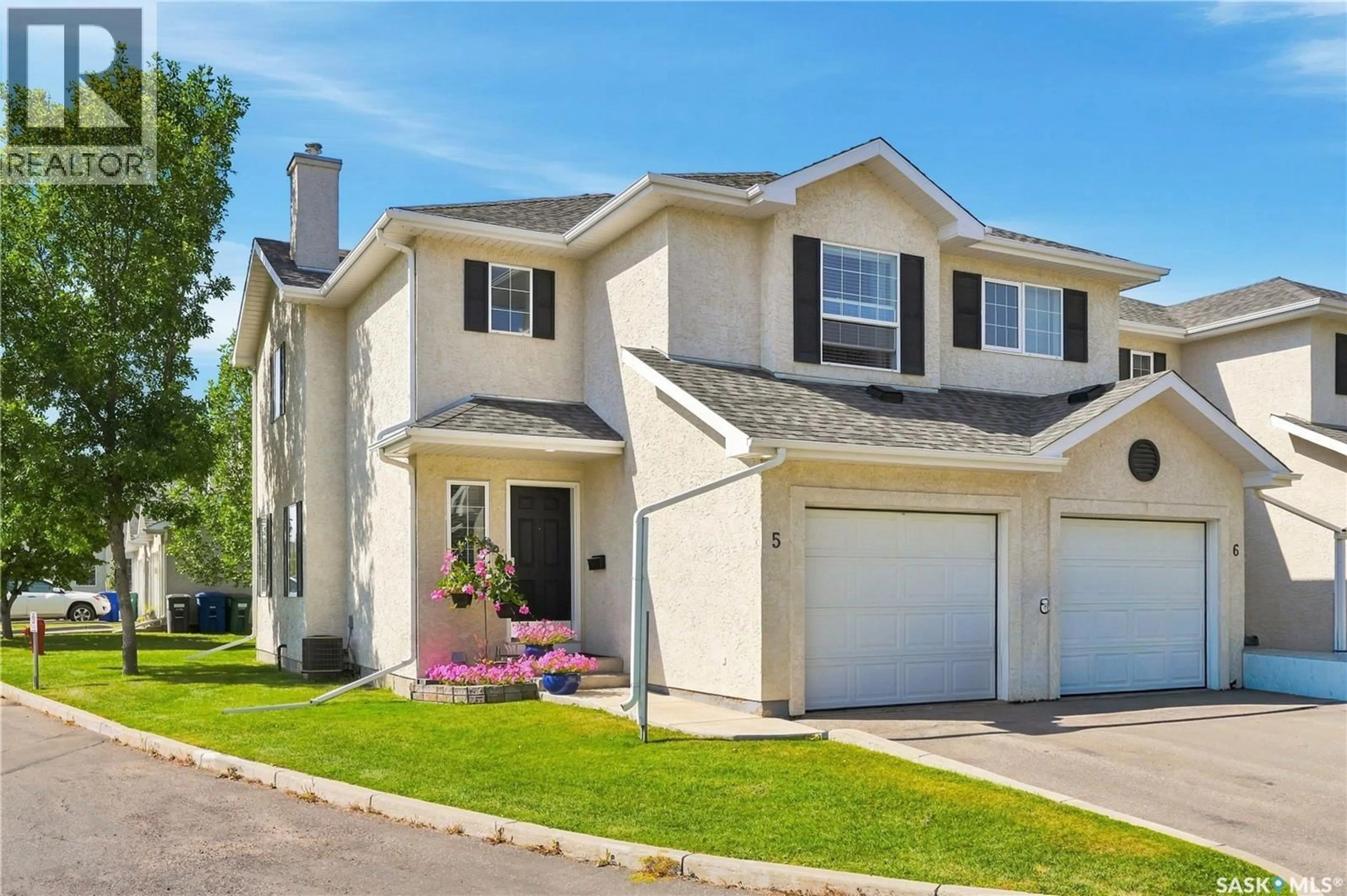 Home with vinyl exterior material, street for 110 - 5 BANYAN CRESCENT, Saskatoon Saskatchewan S7V1G7