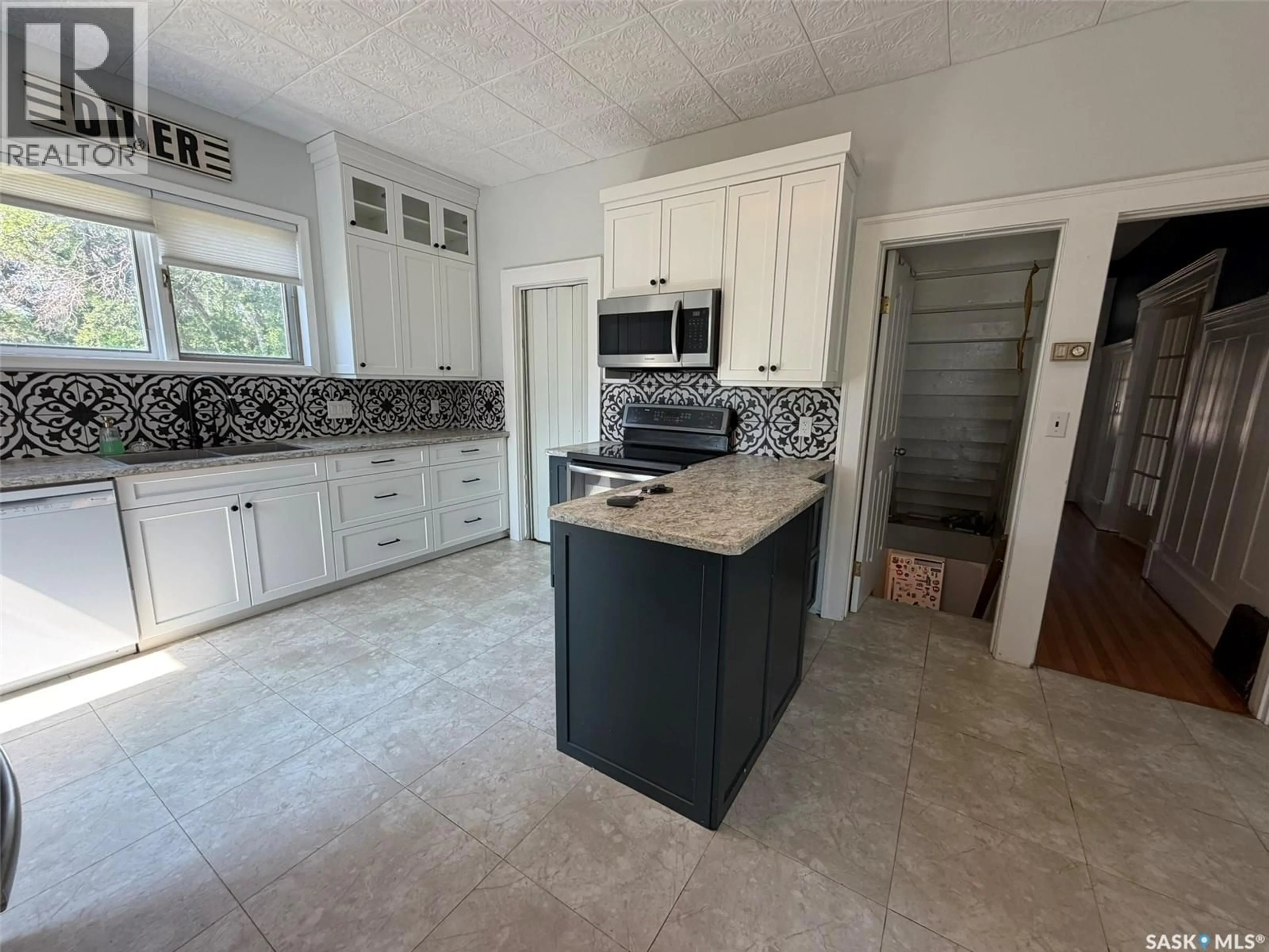Open concept kitchen, ceramic/tile floor for 229 4TH AVENUE, Lafleche Saskatchewan S0H2K0