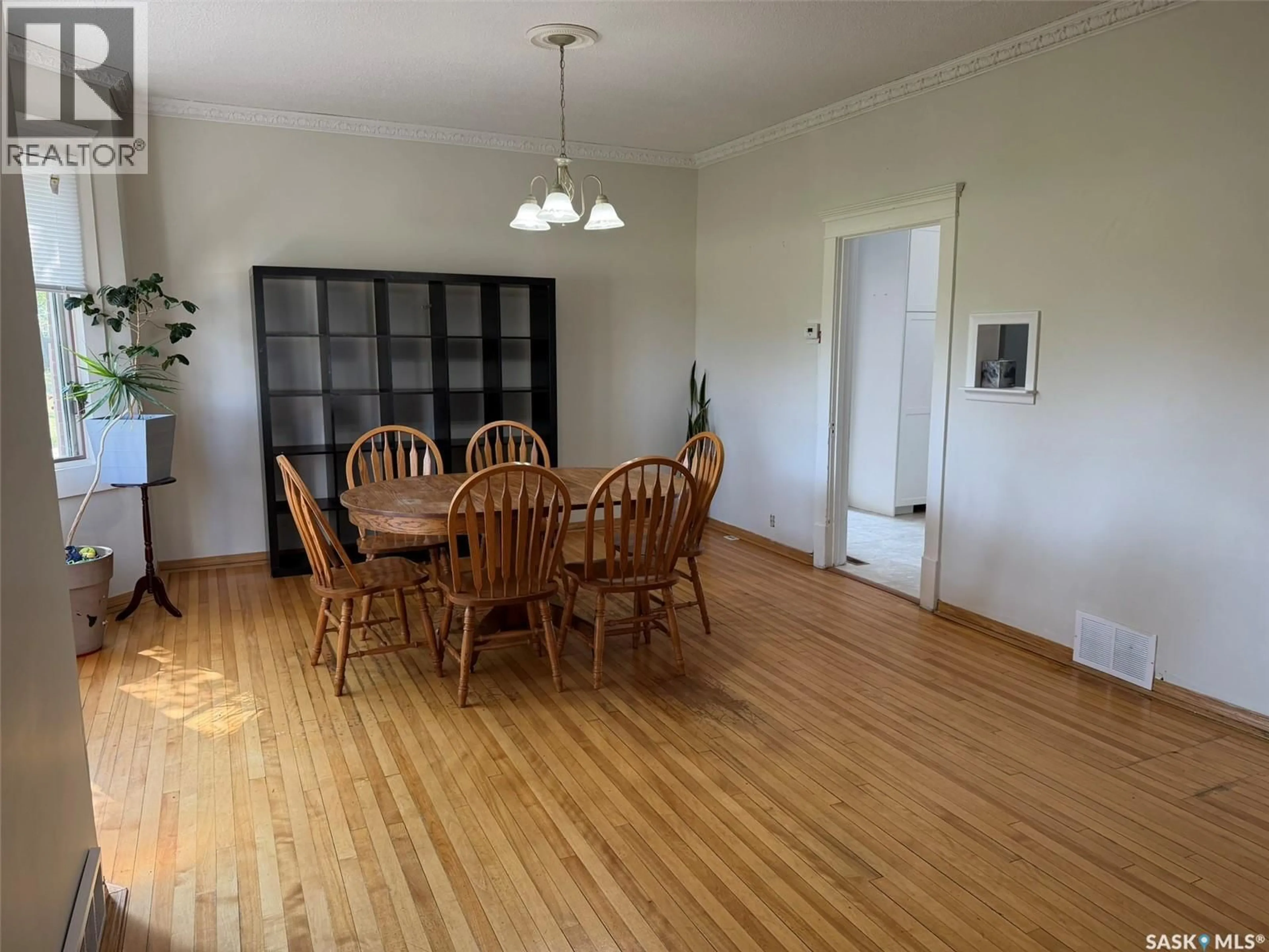 Dining room, wood/laminate floor for 229 4TH AVENUE, Lafleche Saskatchewan S0H2K0