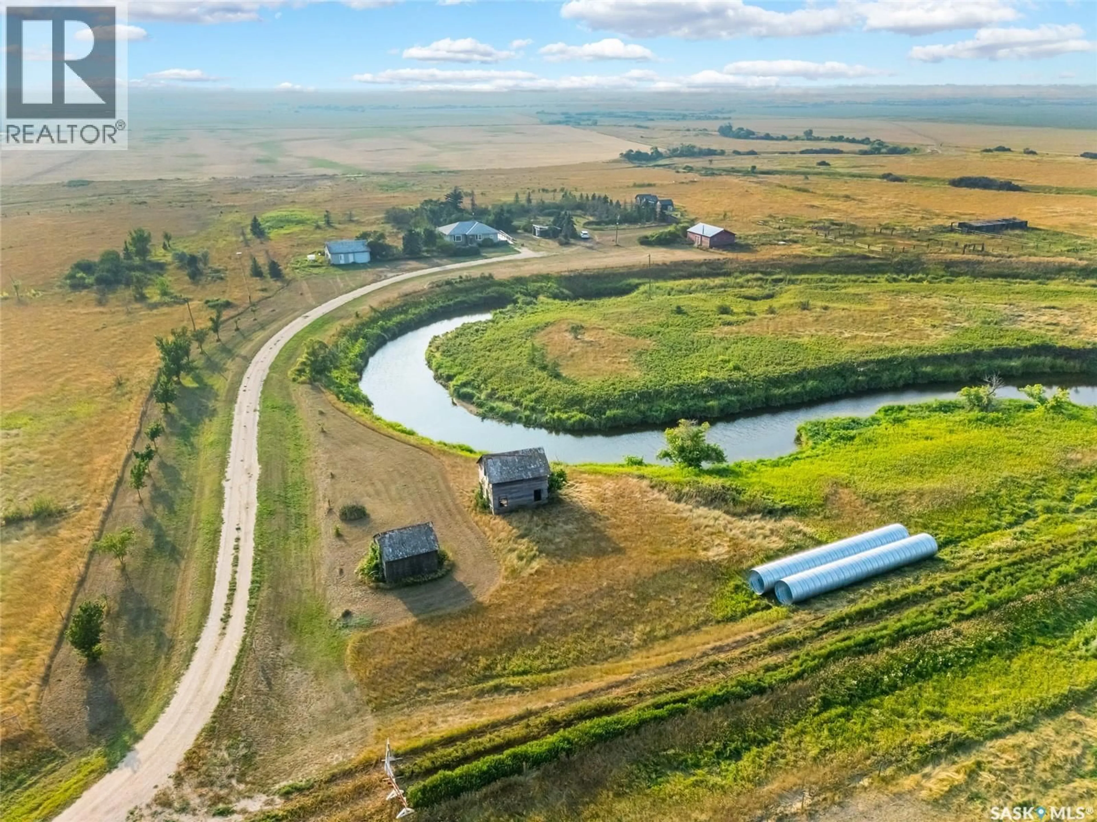 A pic from outside/outdoor area/front of a property/back of a property/a pic from drone, water/lake/river/ocean view for CREEKBEND ACREAGE, Rosedale Rm No. 283 Saskatchewan S0G2E0