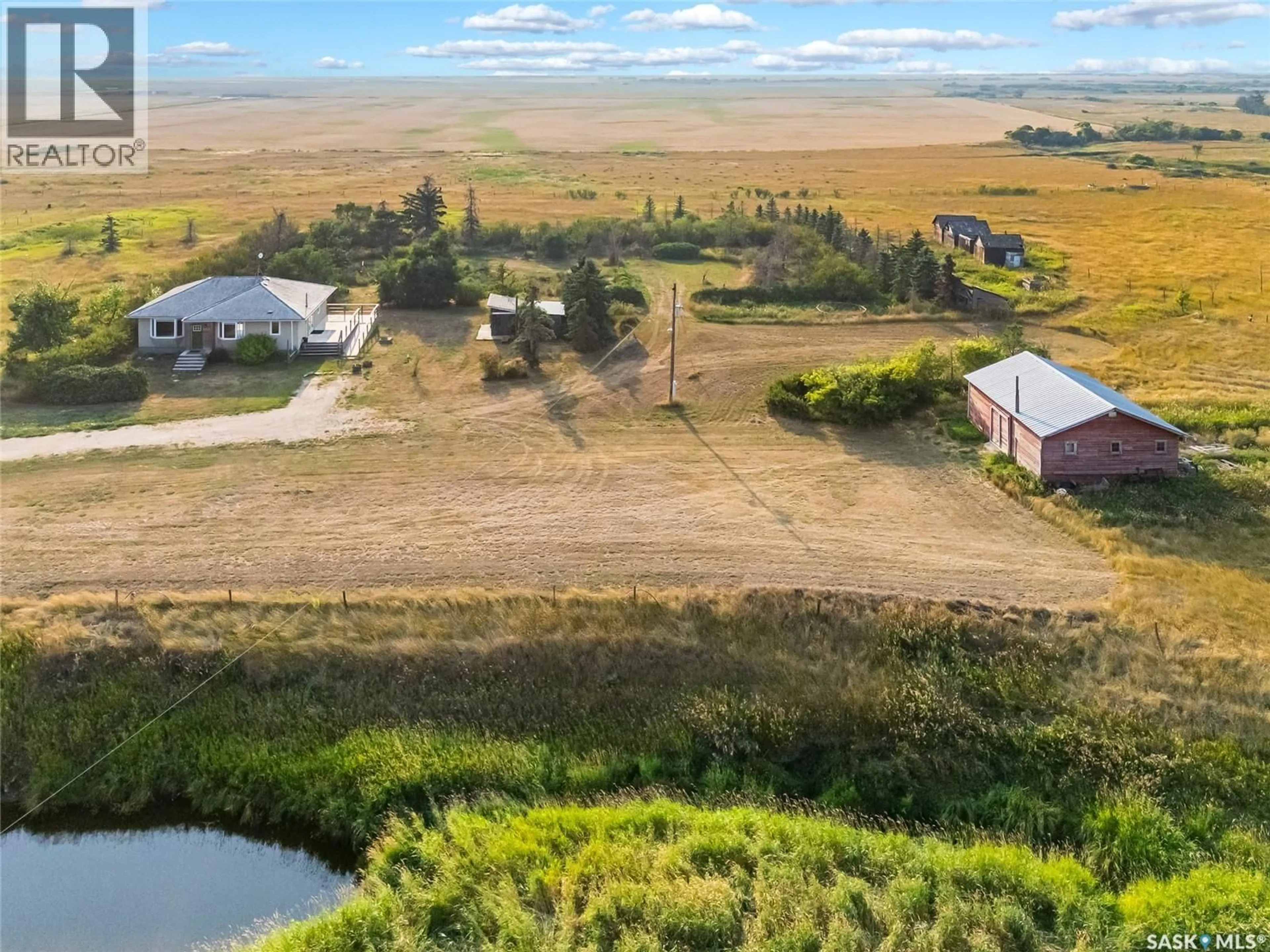 A pic from outside/outdoor area/front of a property/back of a property/a pic from drone, water/lake/river/ocean view for CREEKBEND ACREAGE, Rosedale Rm No. 283 Saskatchewan S0G2E0