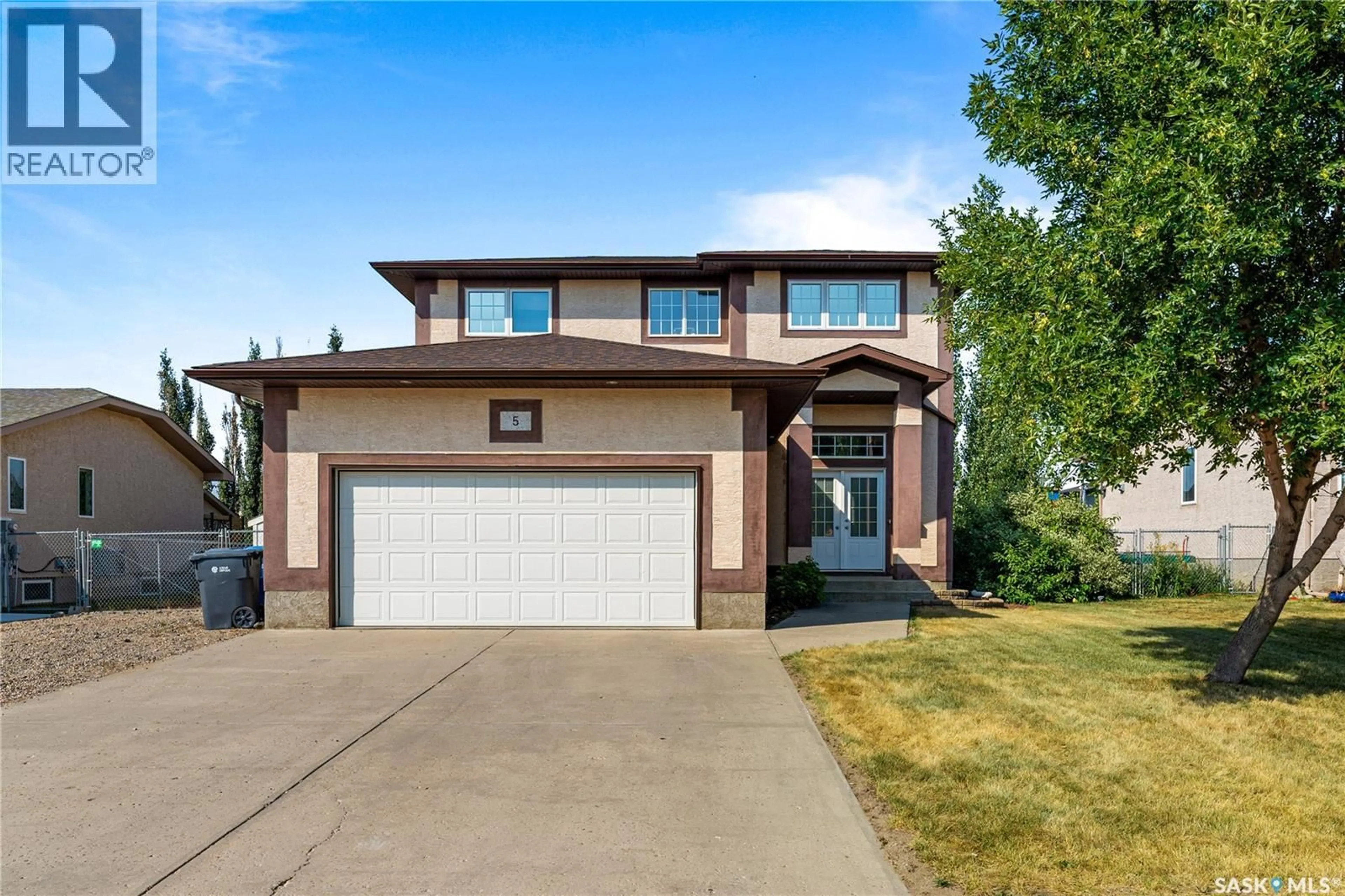 Home with vinyl exterior material, street for 5 SIMPSON BAY, Balgonie Saskatchewan S0G0E0