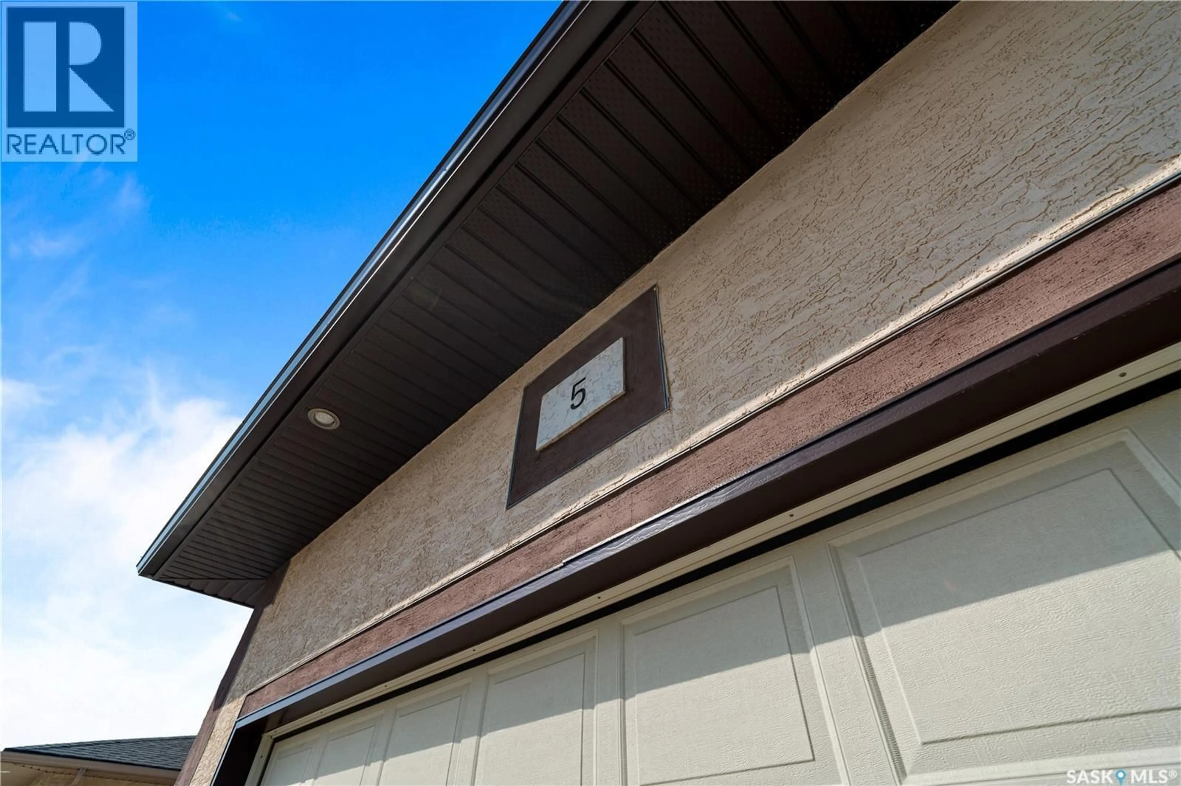 Home with vinyl exterior material, street for 5 SIMPSON BAY, Balgonie Saskatchewan S0G0E0