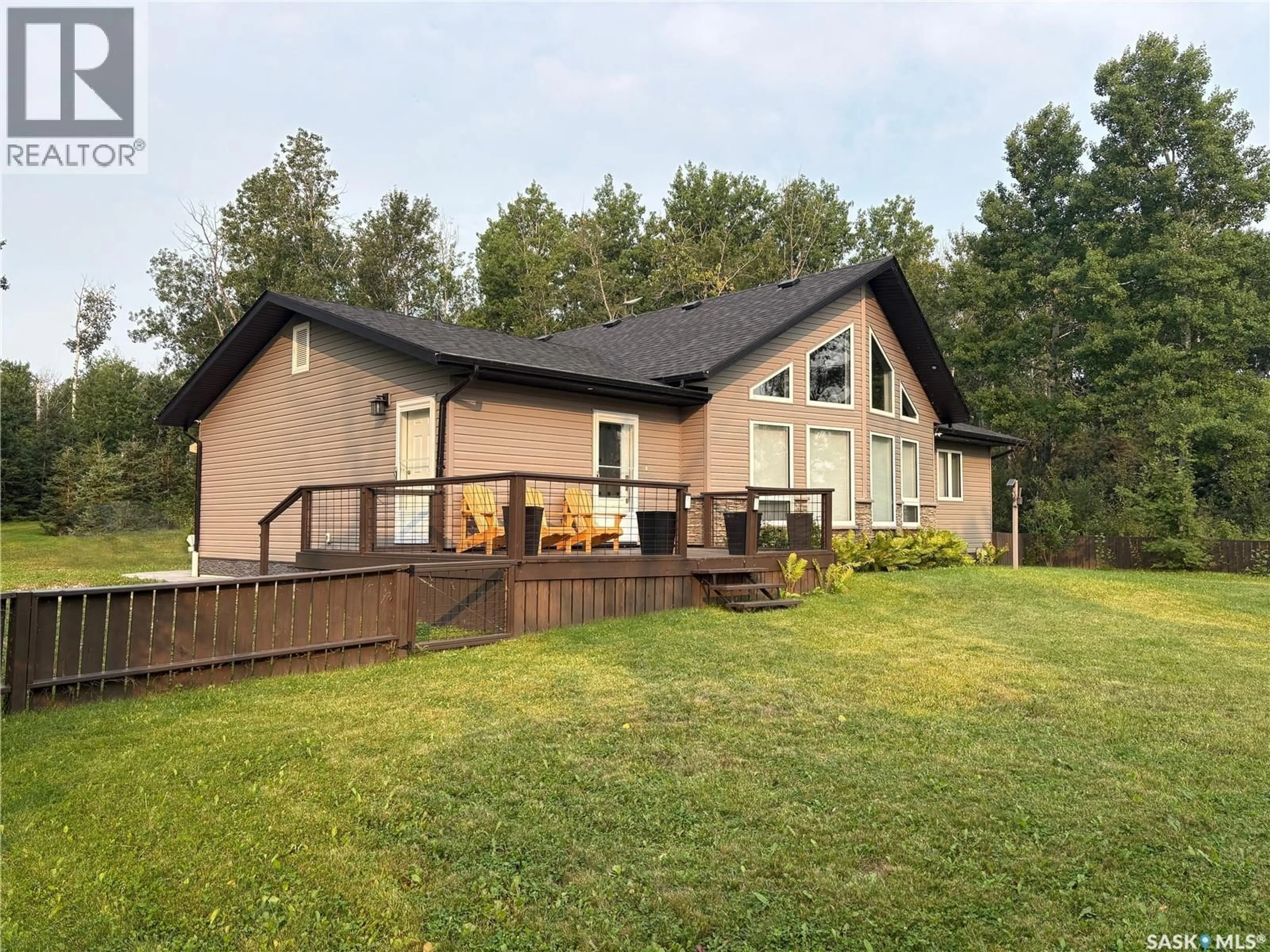 A pic from outside/outdoor area/front of a property/back of a property/a pic from drone, water/lake/river/ocean view for 5 DELARONDE WAY, Delaronde Lake Saskatchewan S0J0E0