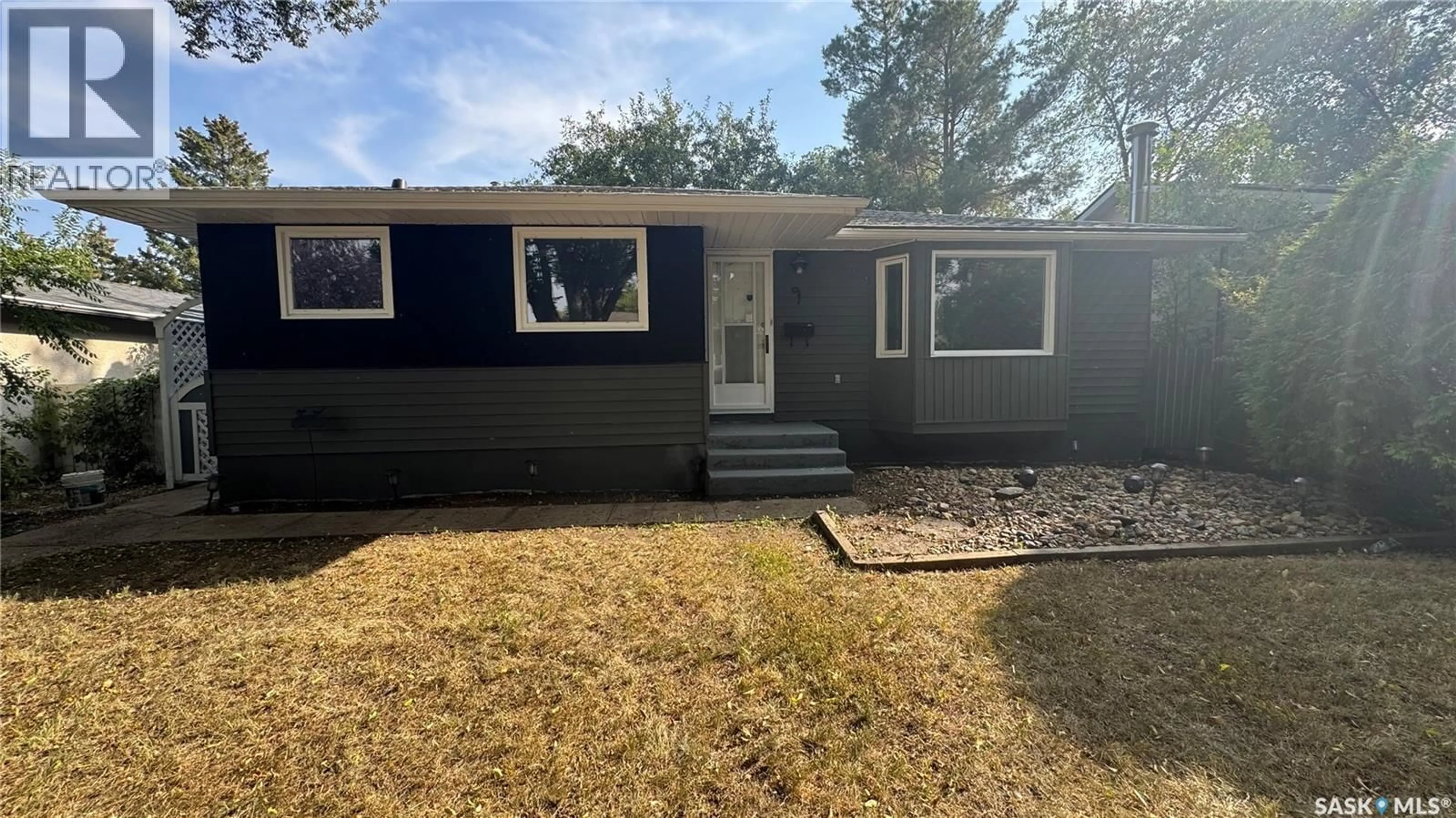 Home with vinyl exterior material, street for 61 BANNISTER AVENUE, Regina Saskatchewan S4R5K8