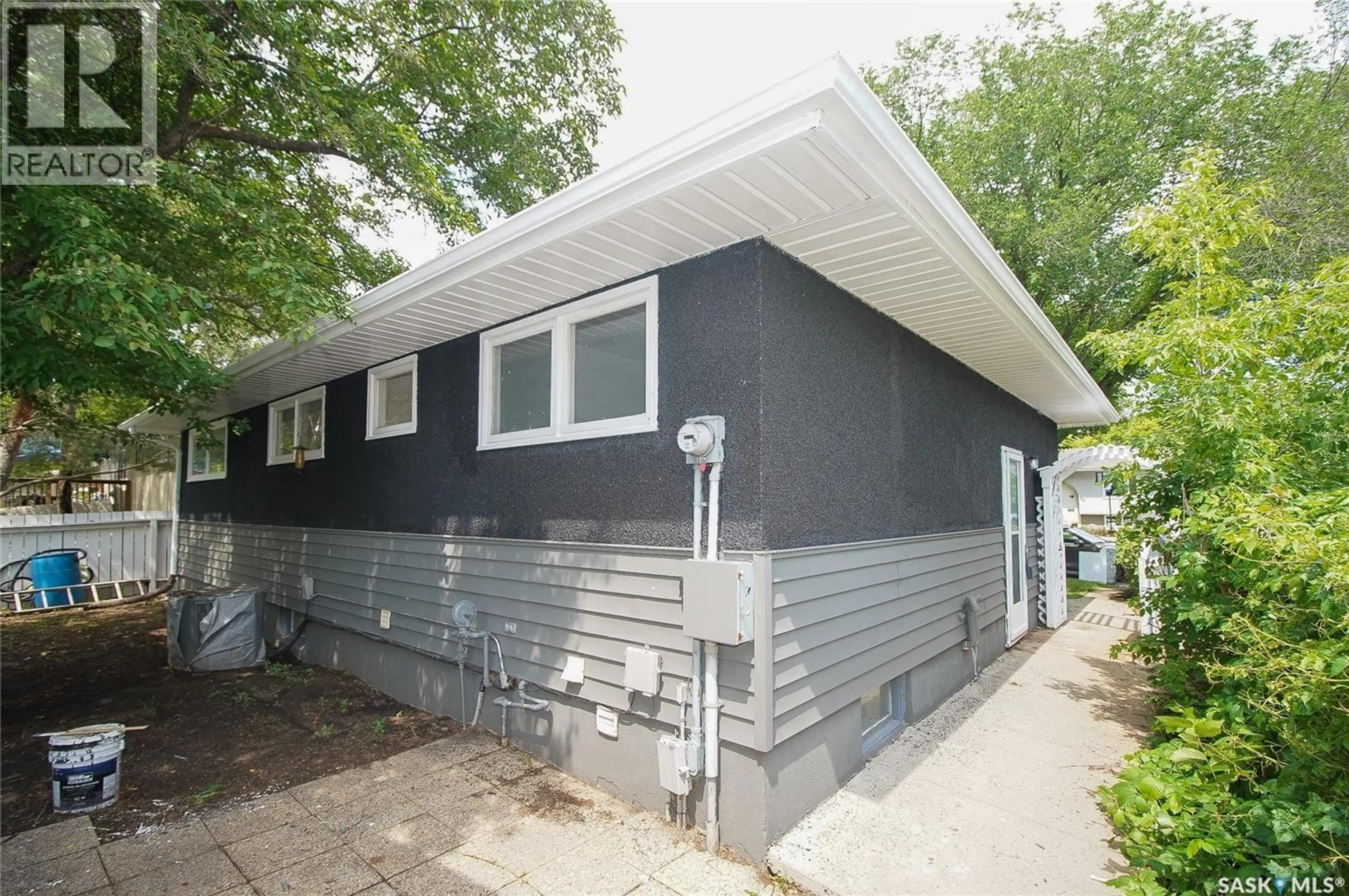 Home with vinyl exterior material, street for 61 BANNISTER AVENUE, Regina Saskatchewan S4R5K8