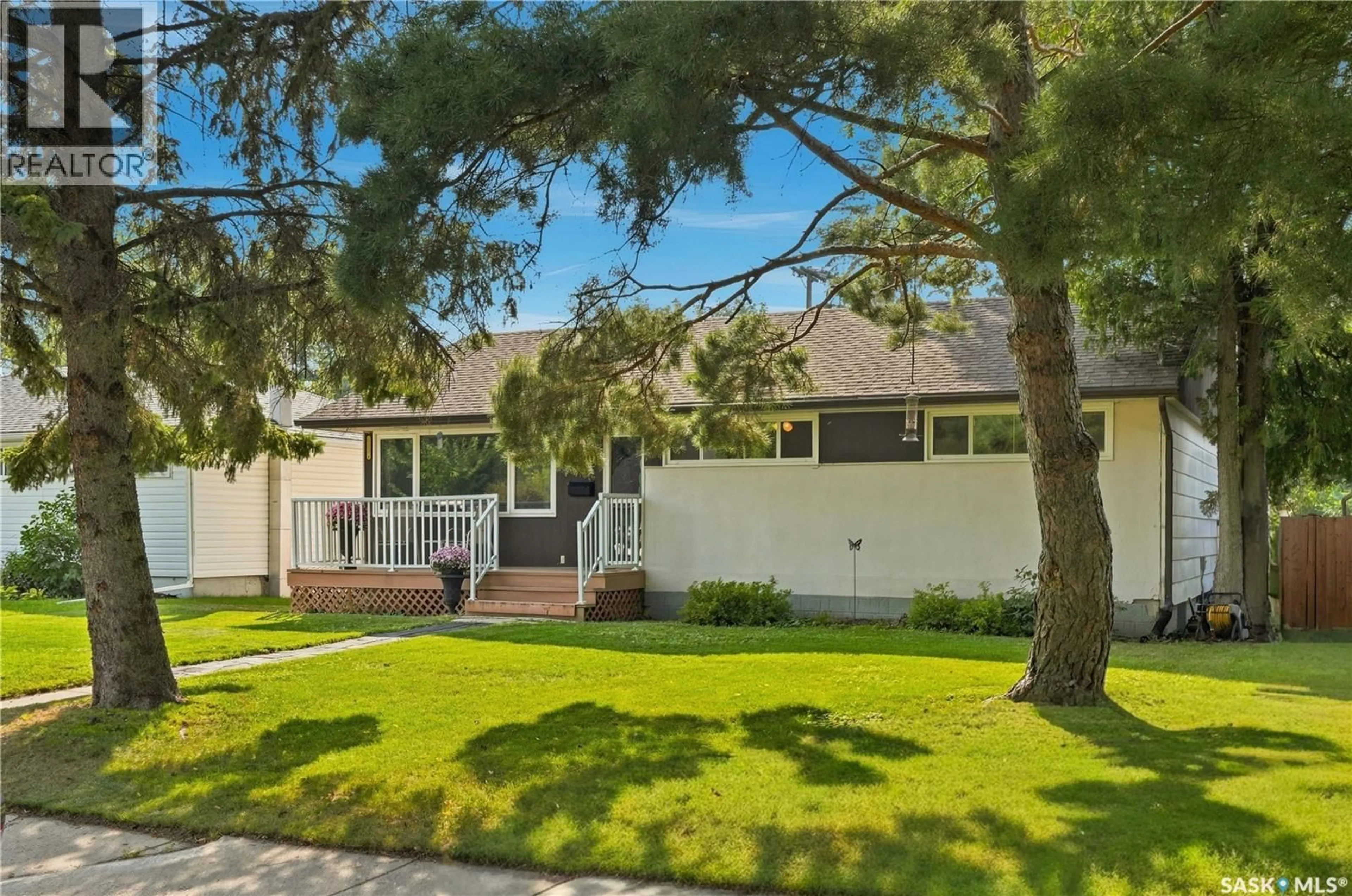 Home with vinyl exterior material, street for 1810 CAIRNS AVENUE, Saskatoon Saskatchewan S7H2J1