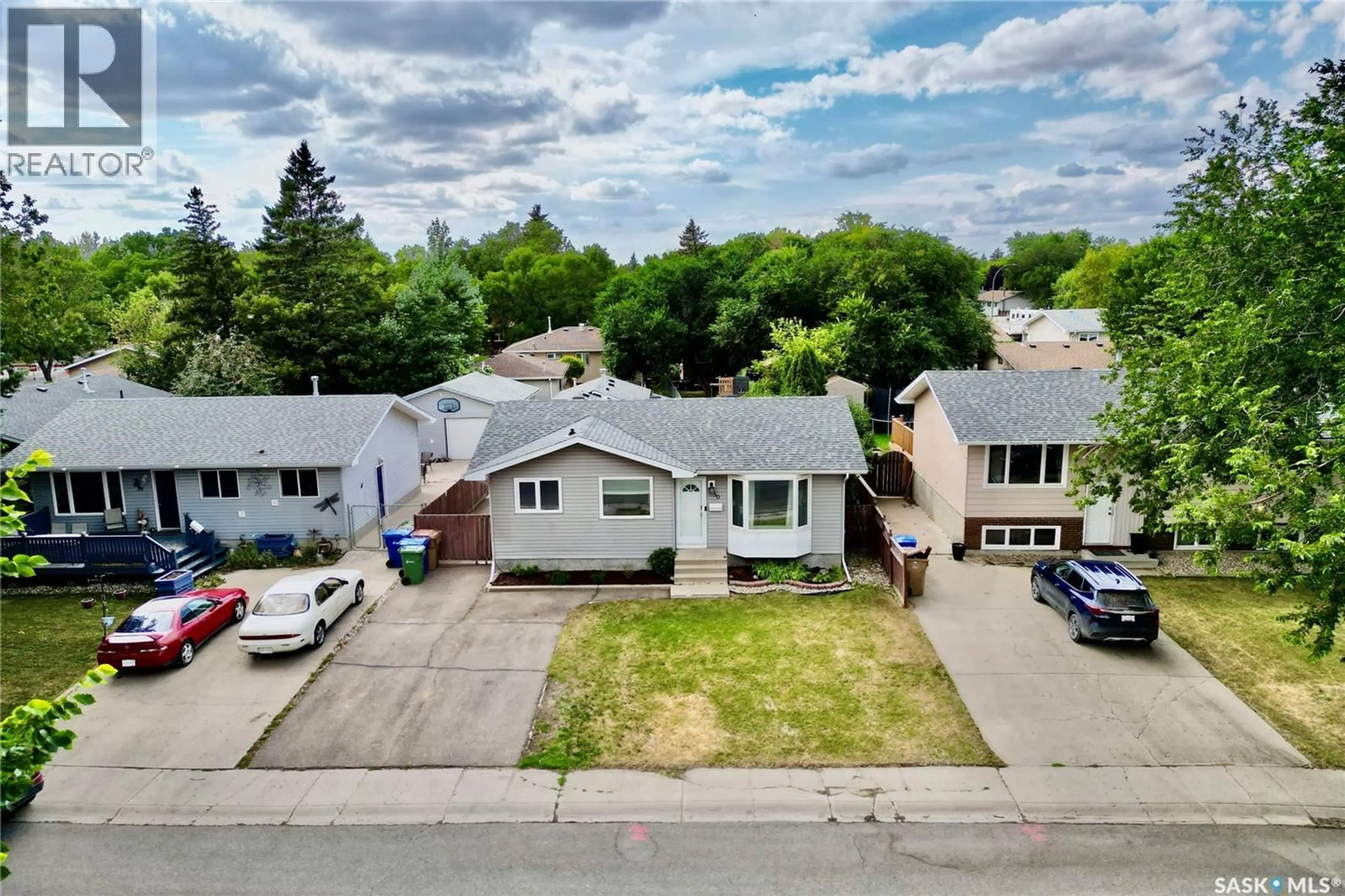 A pic from outside/outdoor area/front of a property/back of a property/a pic from drone, street for 50 MARKWELL DRIVE, Regina Saskatchewan S4X1K3