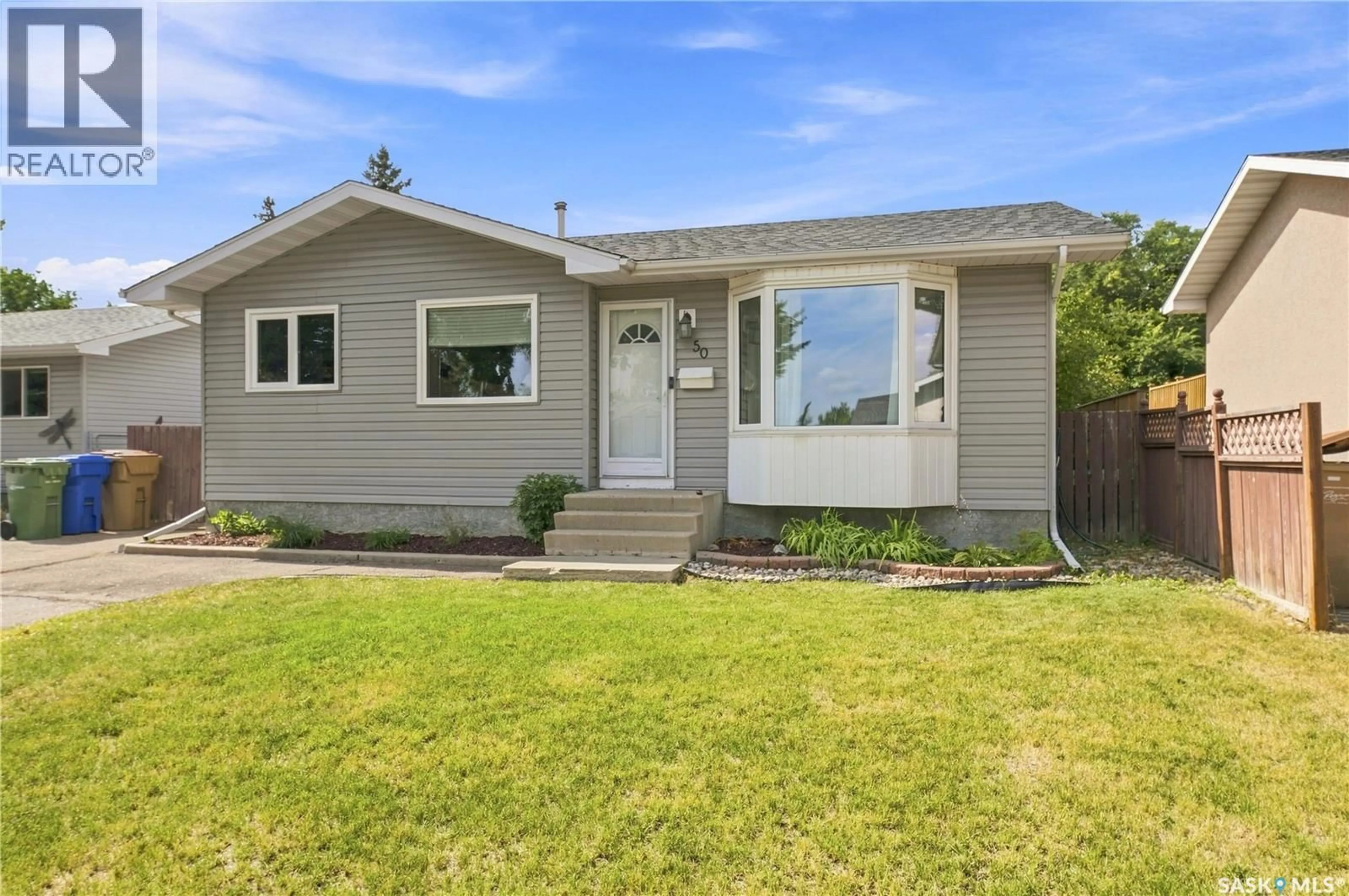 Home with vinyl exterior material, street for 50 MARKWELL DRIVE, Regina Saskatchewan S4X1K3