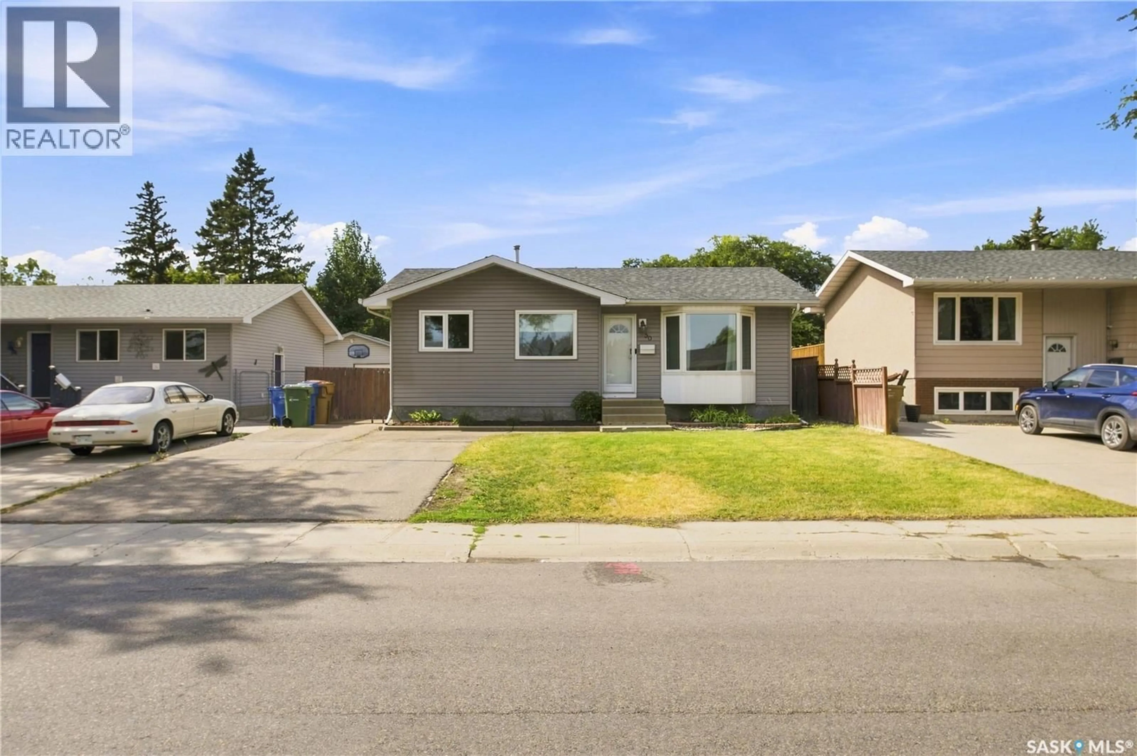 Home with vinyl exterior material, street for 50 MARKWELL DRIVE, Regina Saskatchewan S4X1K3