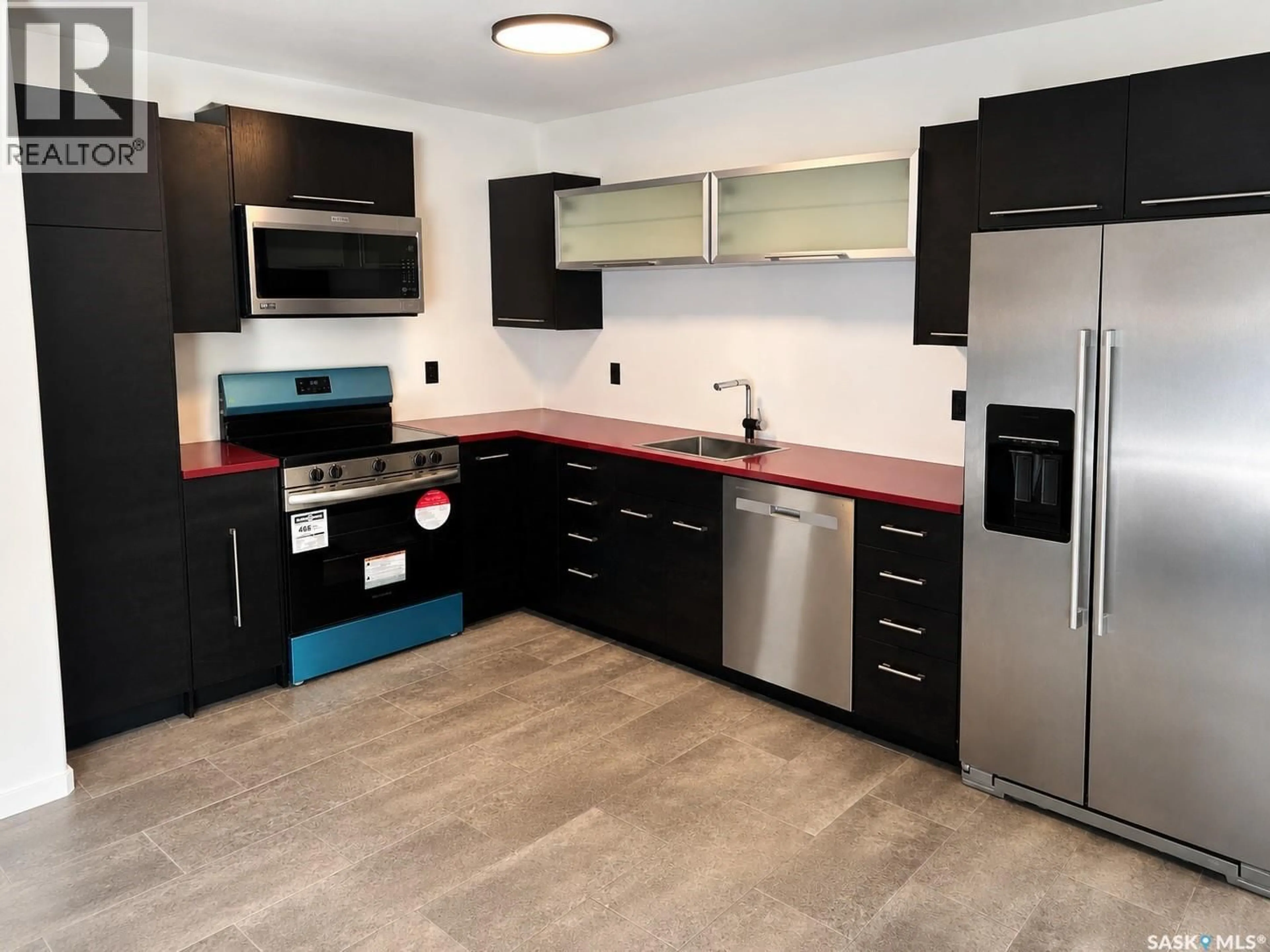 Standard kitchen, ceramic/tile floor for 905A ARGYLE AVENUE, Saskatoon Saskatchewan S7H2V9