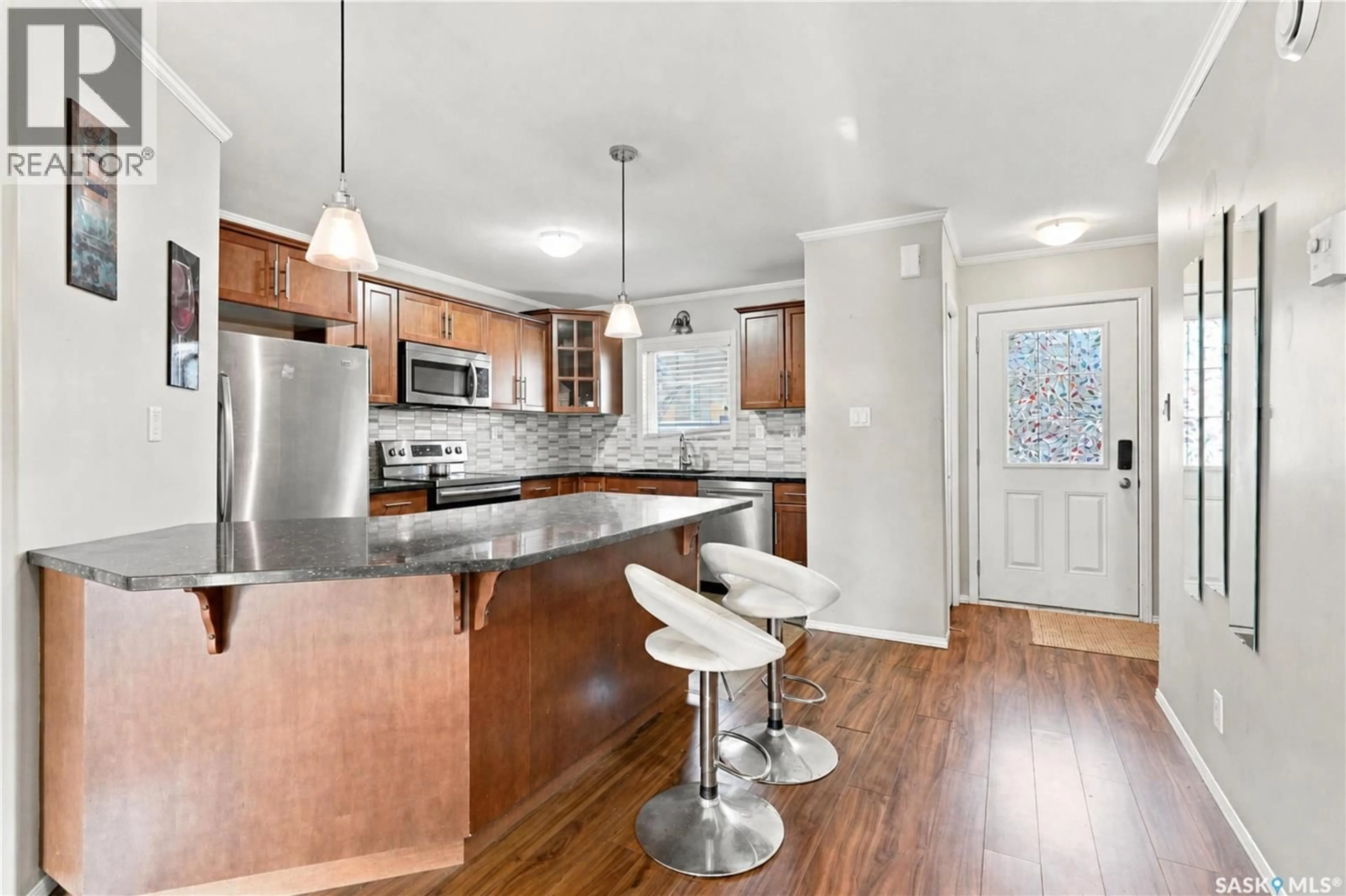 Open concept kitchen, unknown for 202 110 SHILLINGTON CRESCENT, Saskatoon Saskatchewan S7M3Z8
