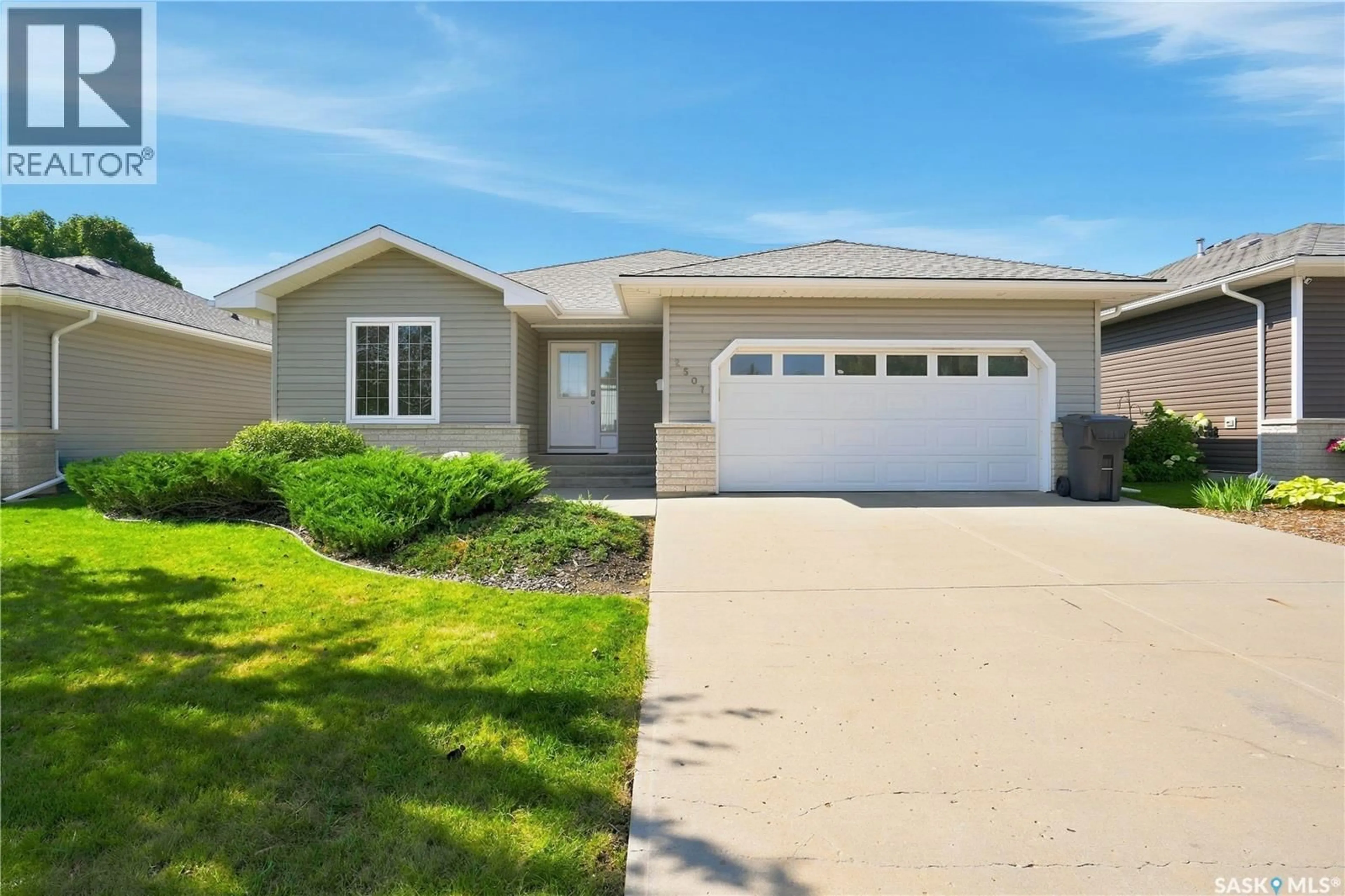 Home with vinyl exterior material, street for 2507 KILDEER DRIVE, North Battleford Saskatchewan S9A3Z2
