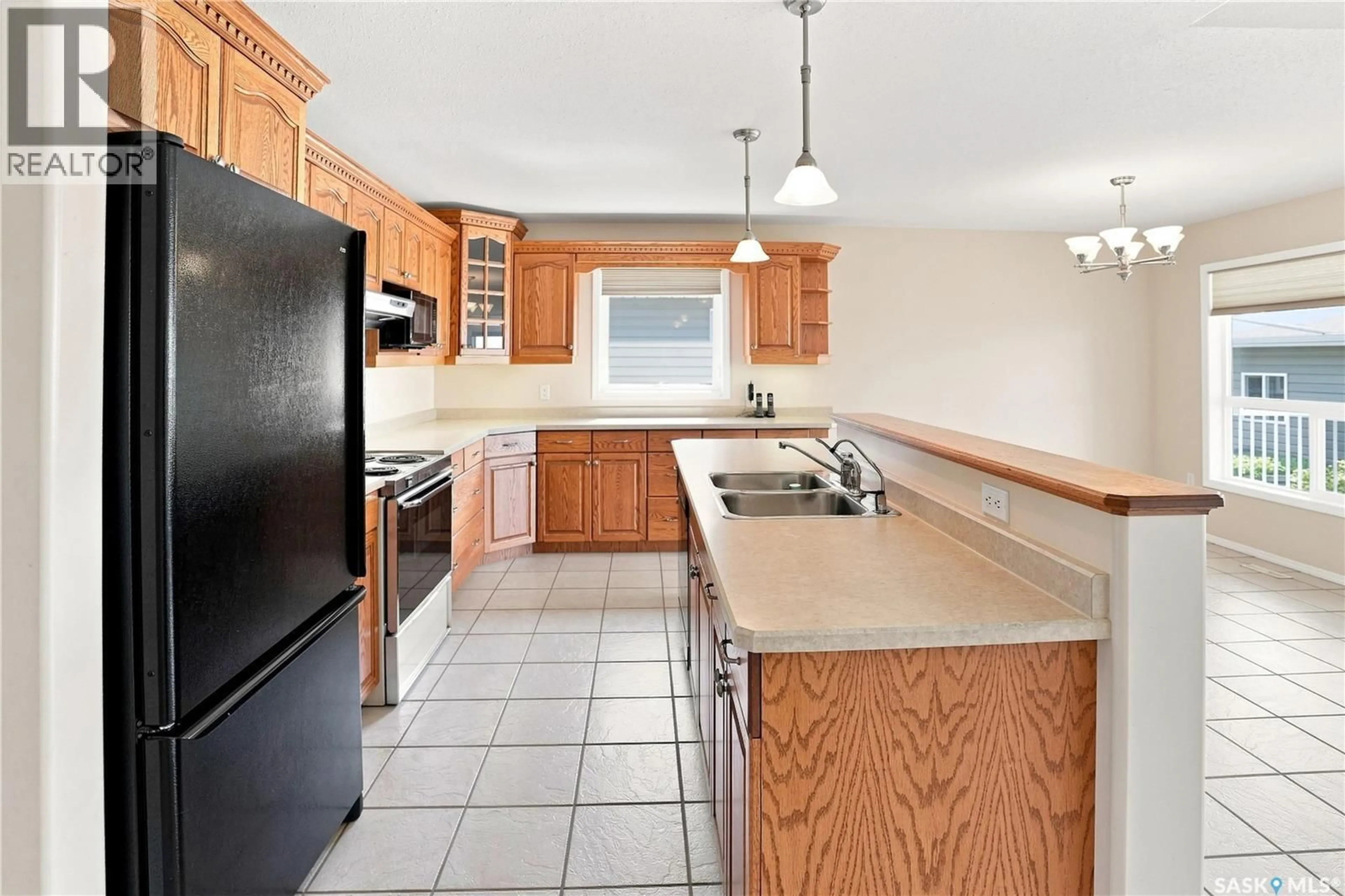 Standard kitchen, ceramic/tile floor for 2507 KILDEER DRIVE, North Battleford Saskatchewan S9A3Z2