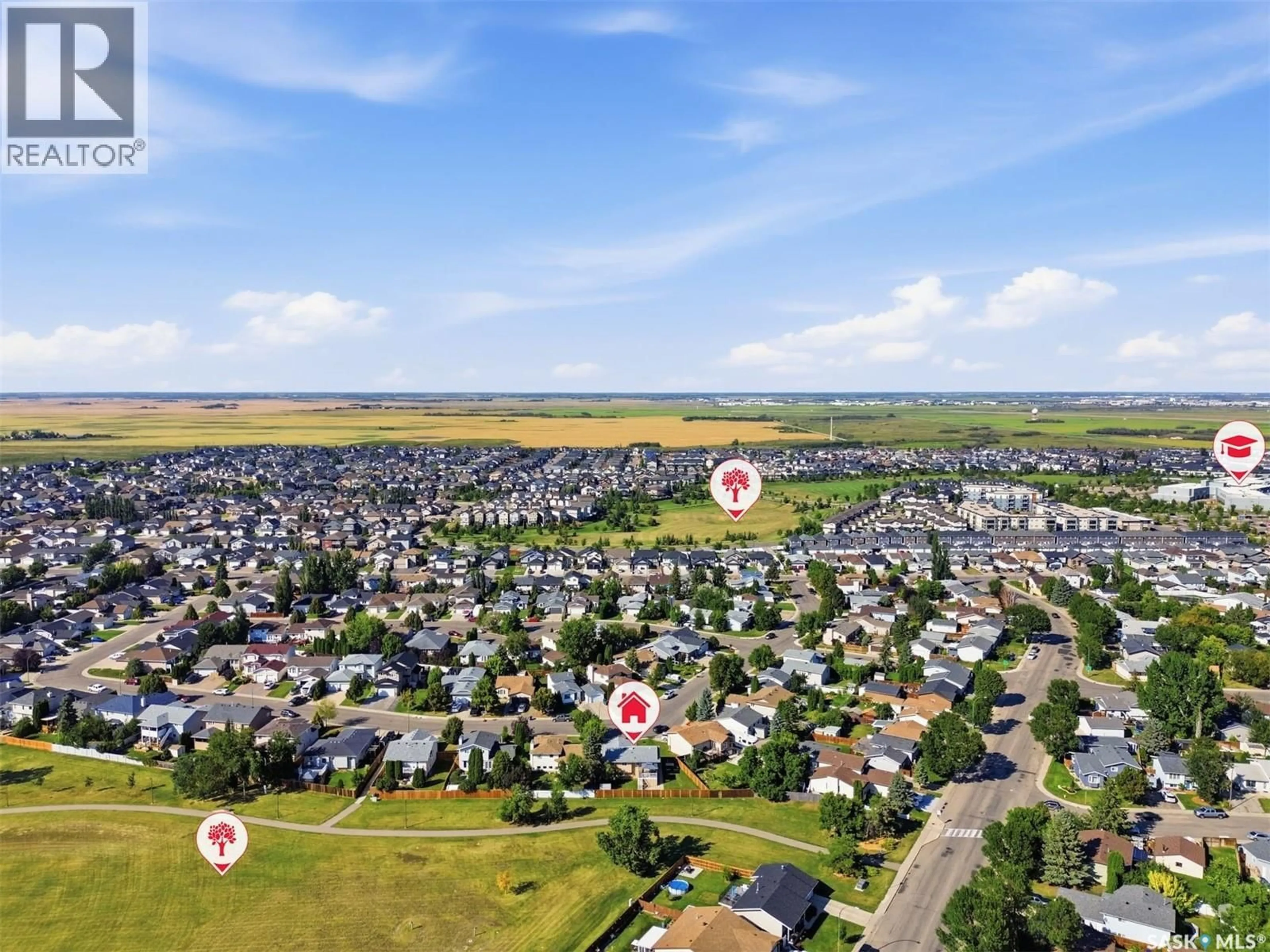 A pic from outside/outdoor area/front of a property/back of a property/a pic from drone, unknown for 302 NIXON CRESCENT, Saskatoon Saskatchewan S7L7G1