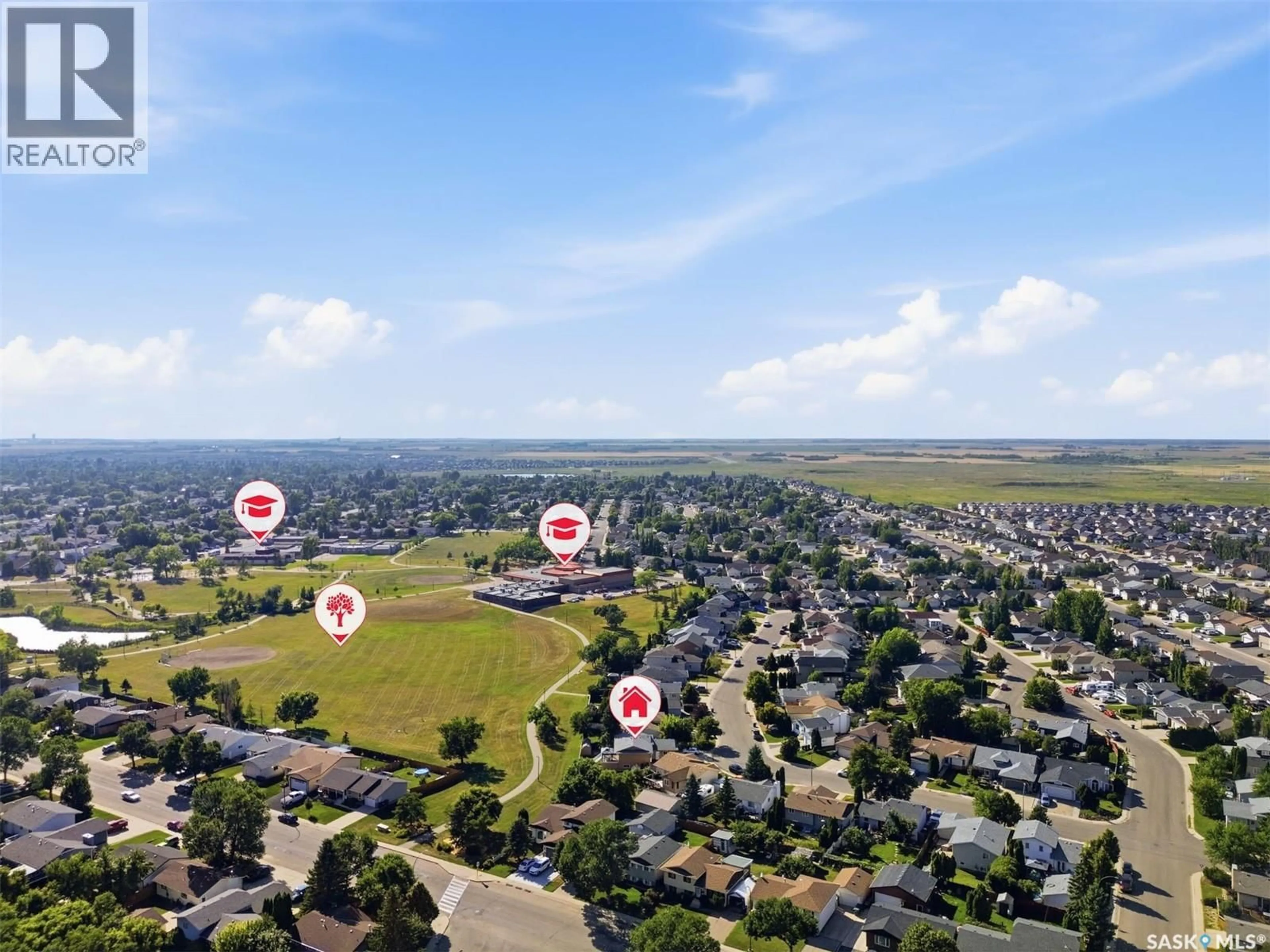 A pic from outside/outdoor area/front of a property/back of a property/a pic from drone, unknown for 302 NIXON CRESCENT, Saskatoon Saskatchewan S7L7G1