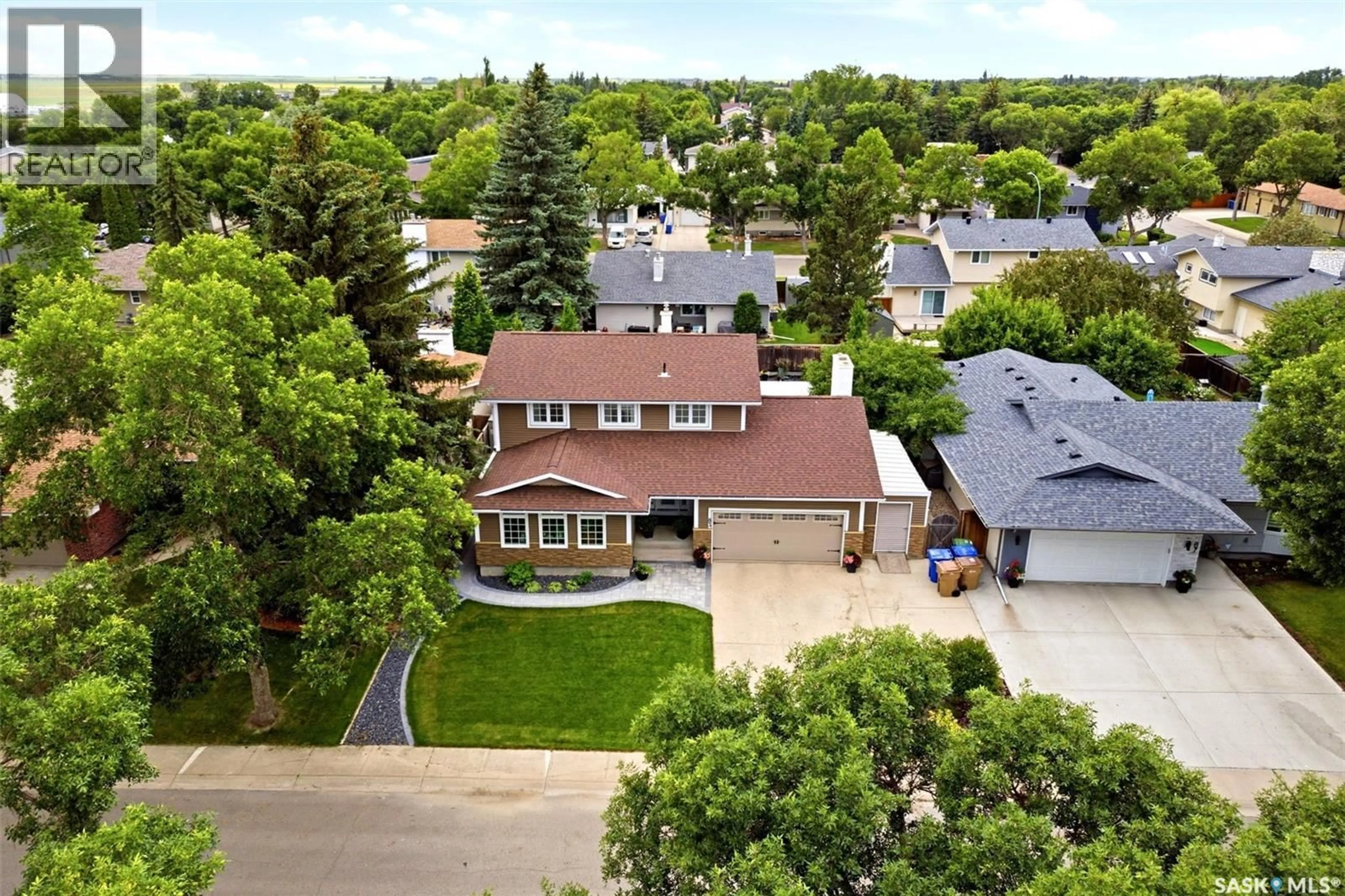 A pic from outside/outdoor area/front of a property/back of a property/a pic from drone, street for 83 MARQUIS CRESCENT, Regina Saskatchewan S4S6J8