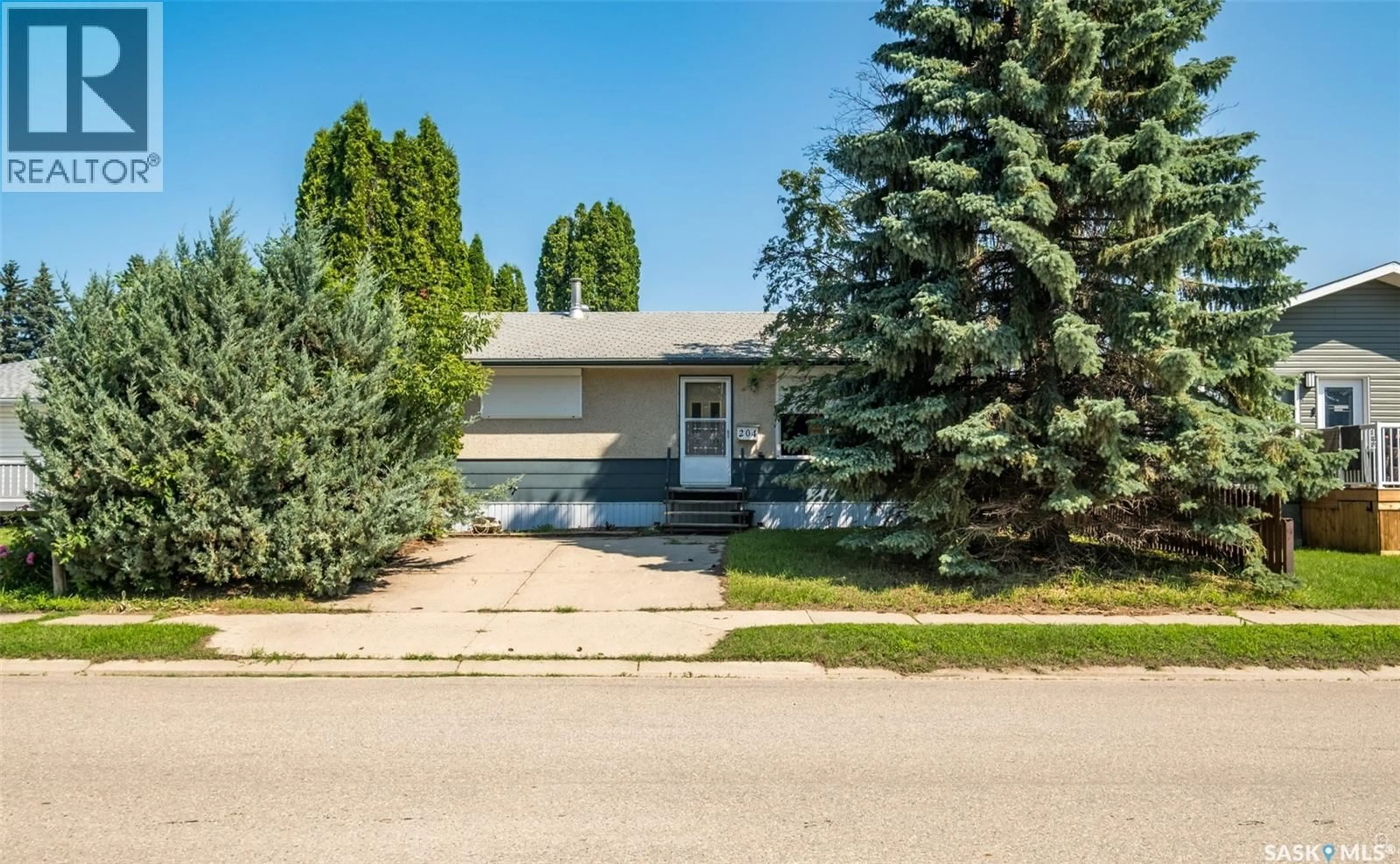 Home with vinyl exterior material, street for 204 2ND AVENUE, Shellbrook Saskatchewan S0J2E0
