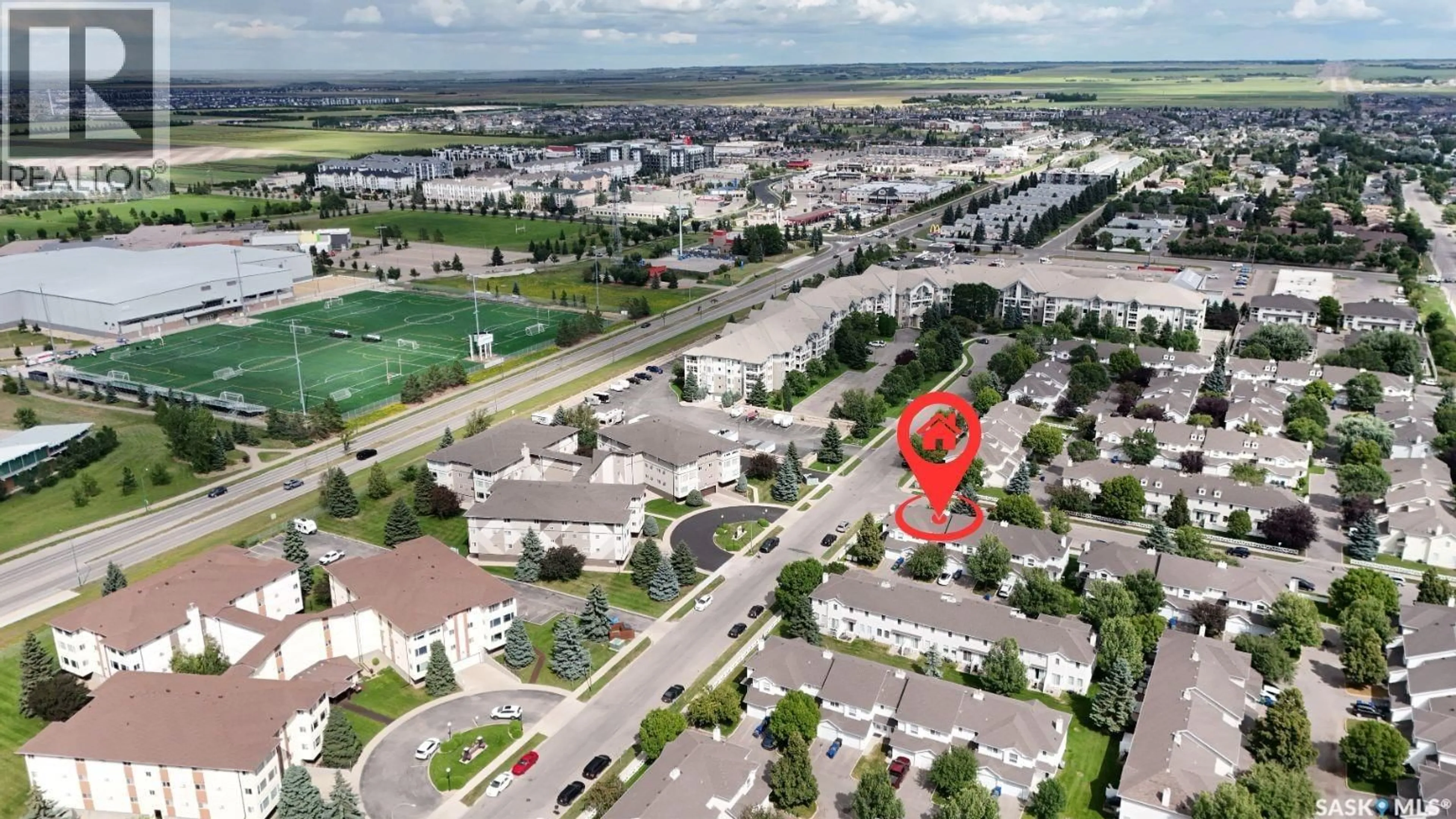 A pic from outside/outdoor area/front of a property/back of a property/a pic from drone, street for 2 110 KEEVIL CRESCENT, Saskatoon Saskatchewan S7N4N8