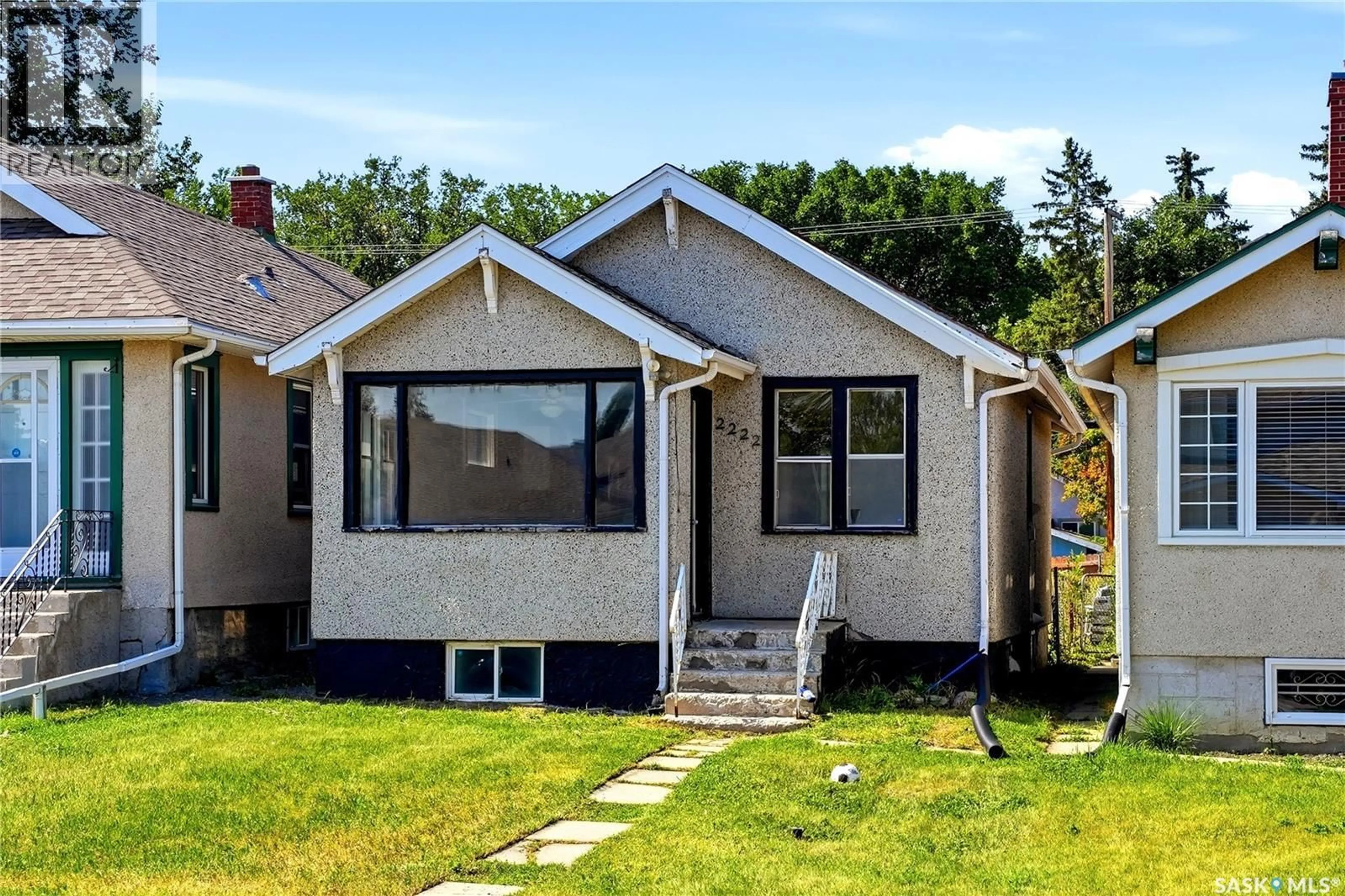 Home with vinyl exterior material, street for 2222 WALLACE STREET, Regina Saskatchewan S4S3H4